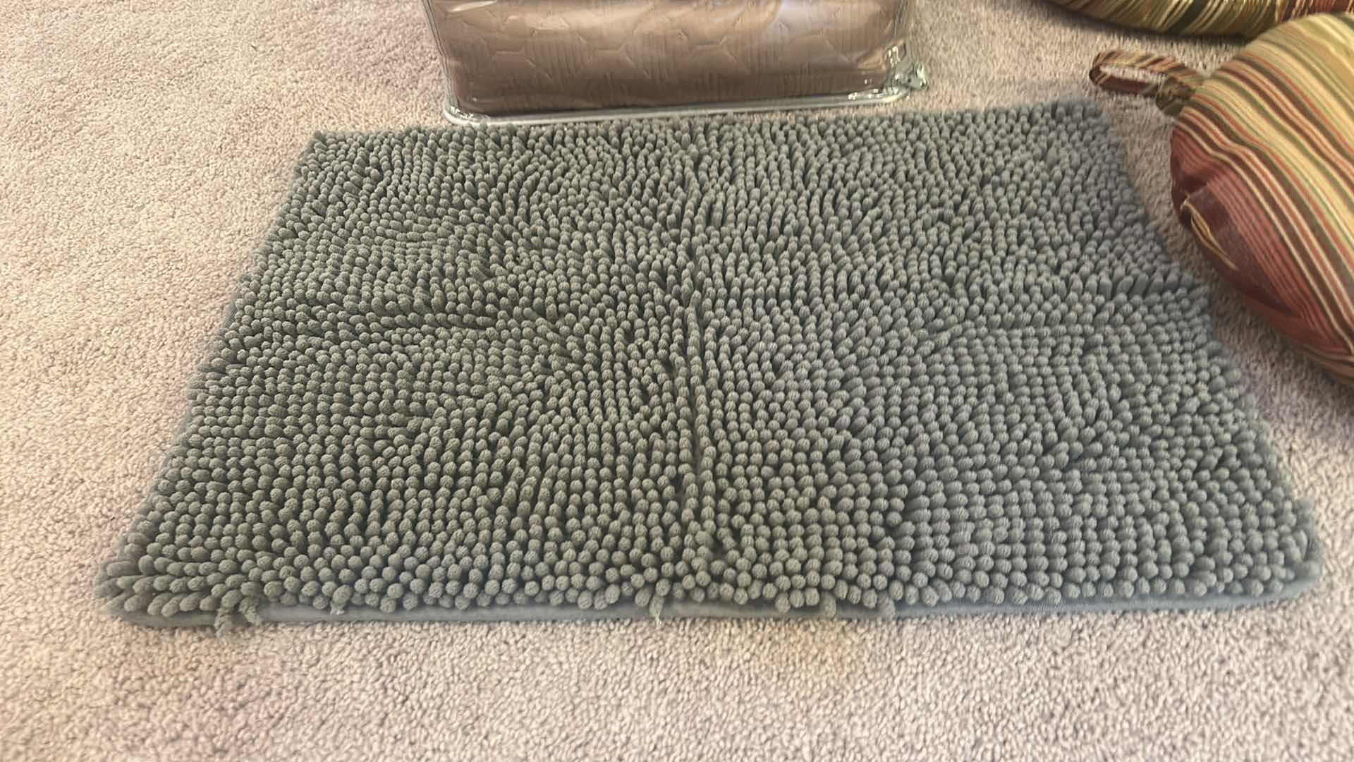 View 3 of NEW QUEEN SHEET SET, ROUND PILLOW CUSHIONS, AND SMALL RUG rug is 24” x 17”