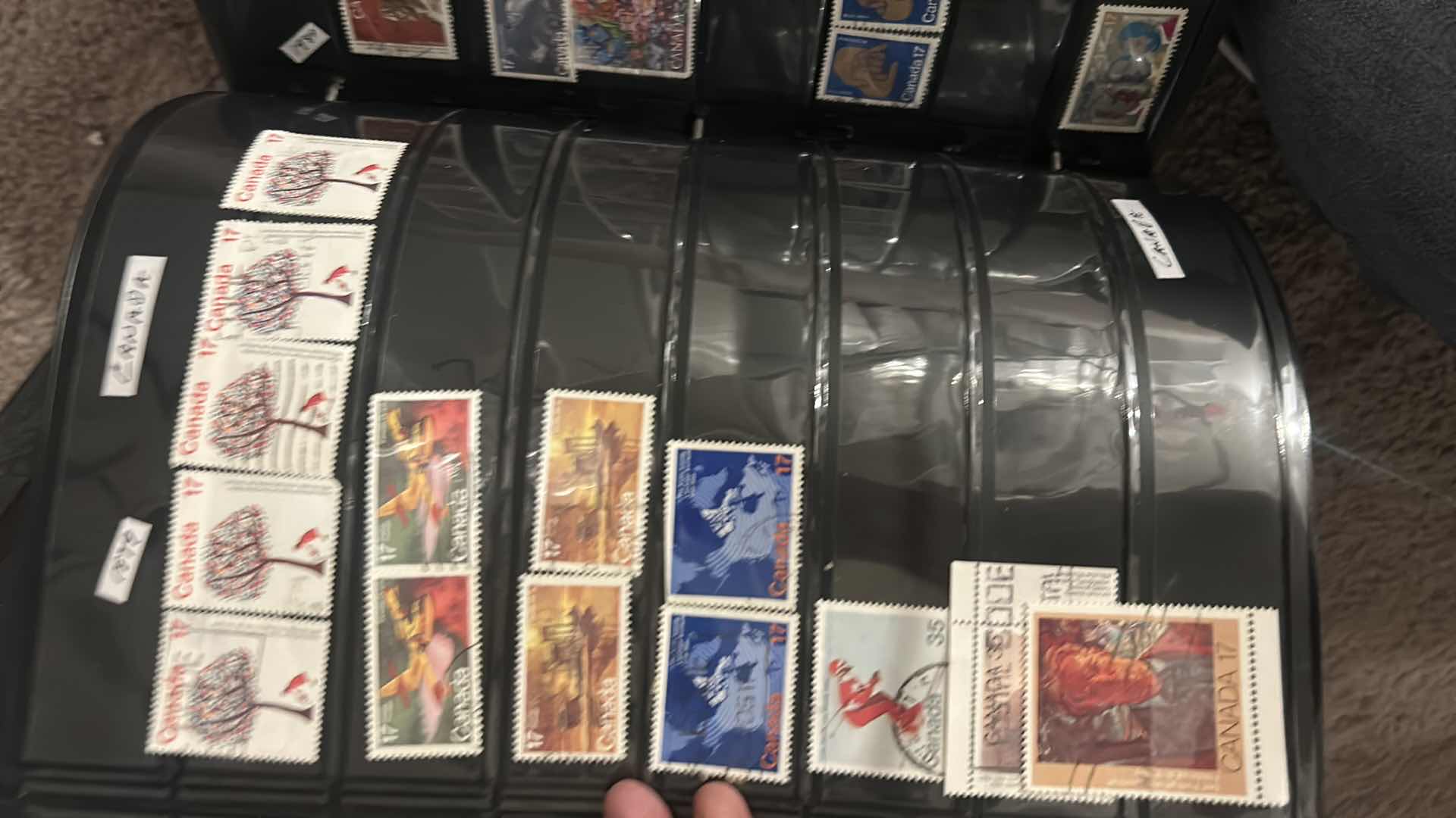 View 2 of 4 LARGE NOTEBOOKS OF COLLECTIBLE POSTAGE STAMPS