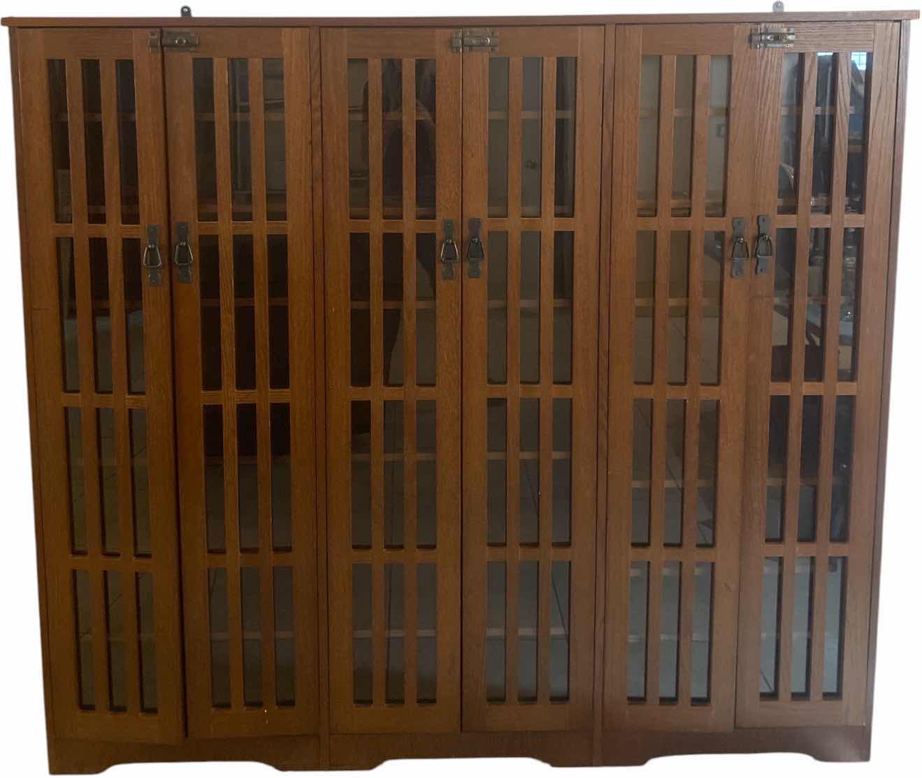 View 1 of MISSION STYLE GLASS DOOR MULTIMEDIA CABINET WITH WALNUT STAIN STAINED OAK VENEER 70” X 10” H 61 1/2”