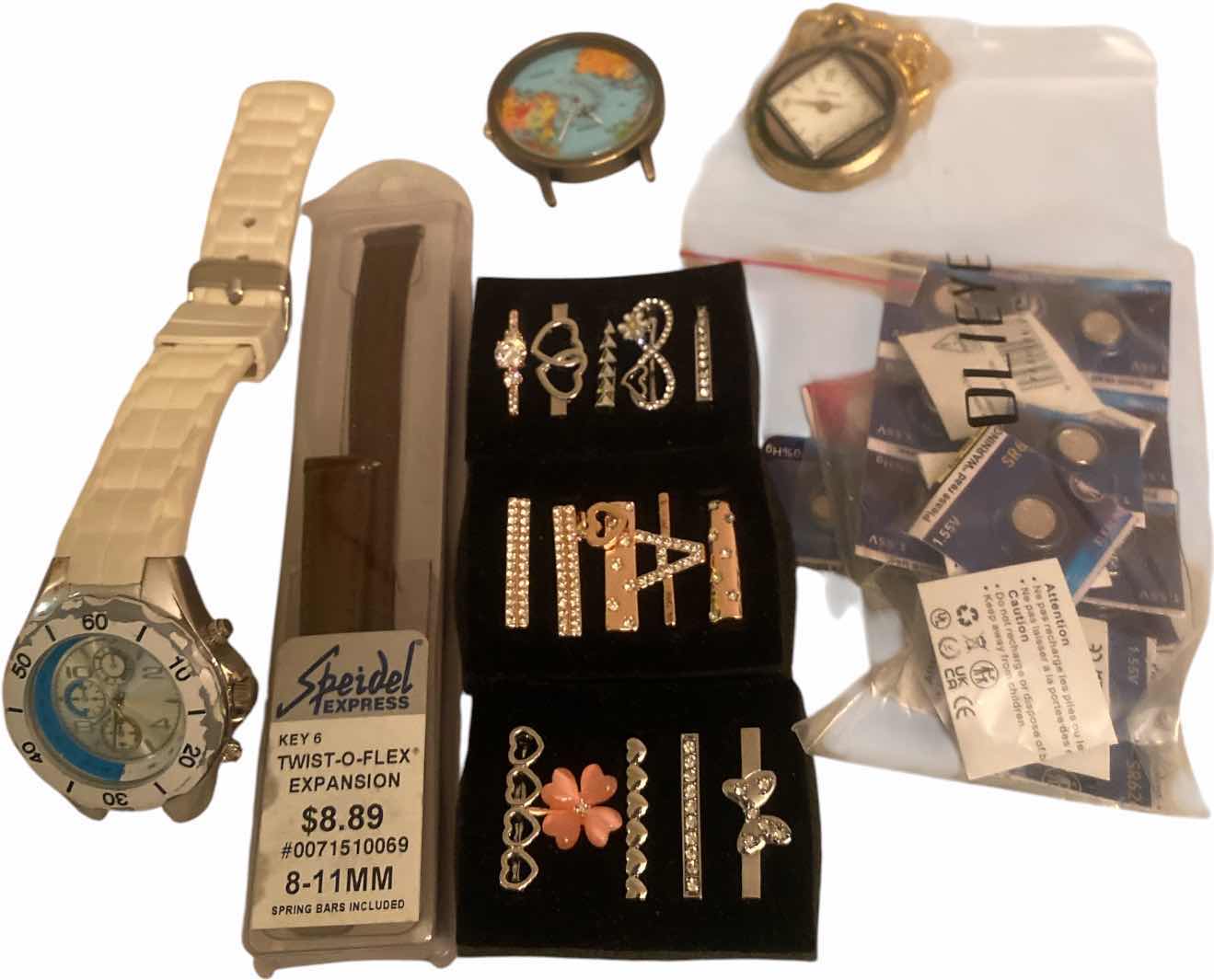 View 1 of WATCH ACCESSORIES (white watch needs a new band)