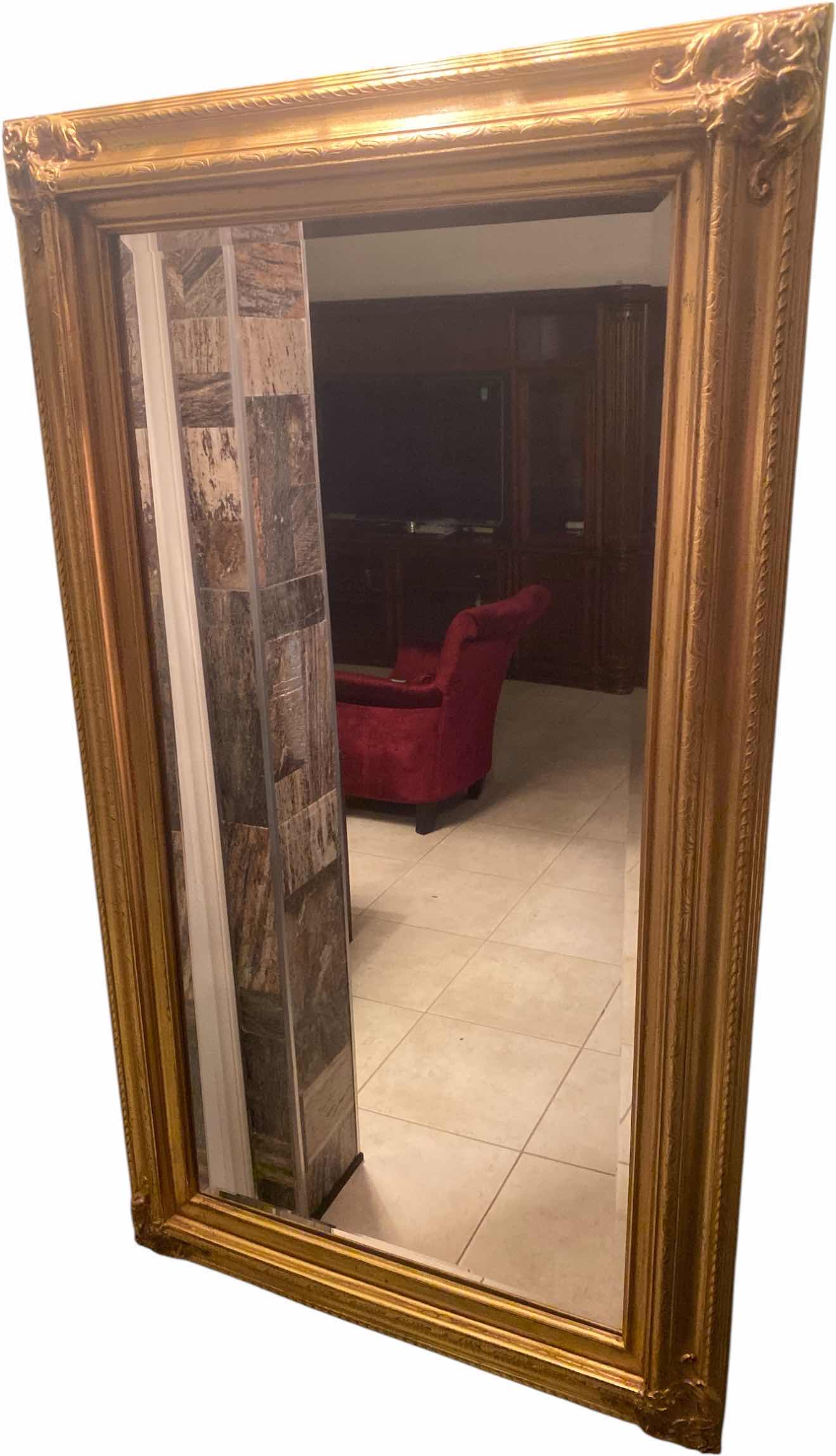 View 1 of GOLD FRAMED BEVELED WALL MIRROR 20” X 35”