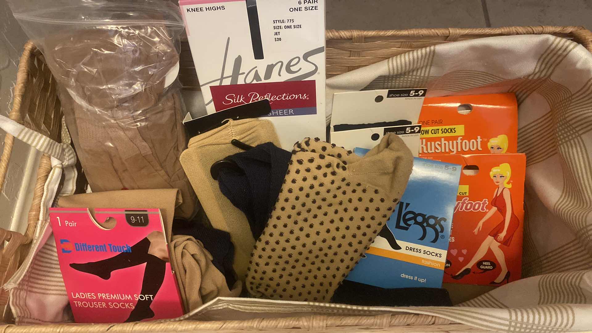 View 2 of BASKET WITH WOMEN’S DRESS SOCKS AND STOCKINGS