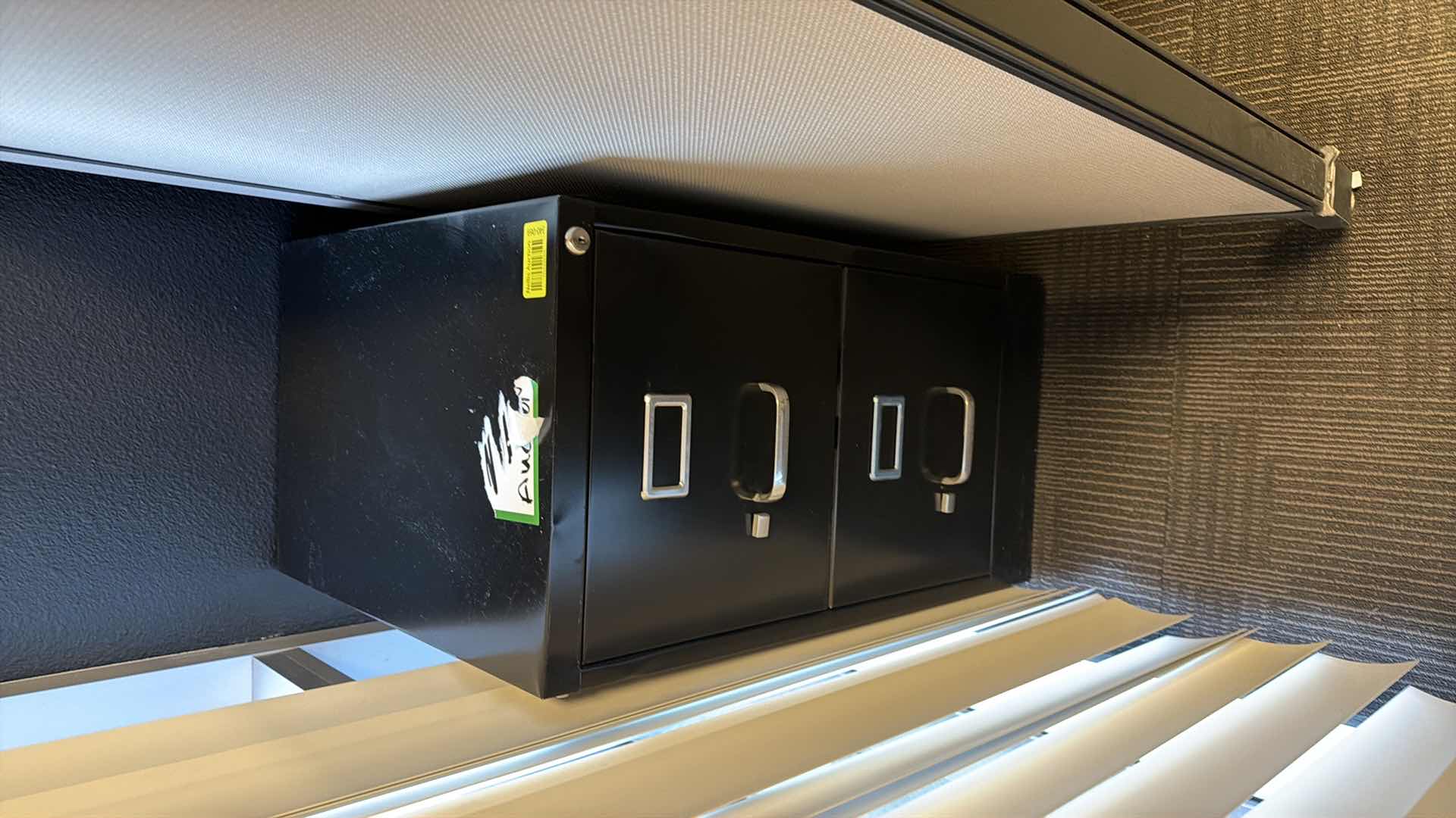Photo 1 of 2 drawer filing cabinet. No keys