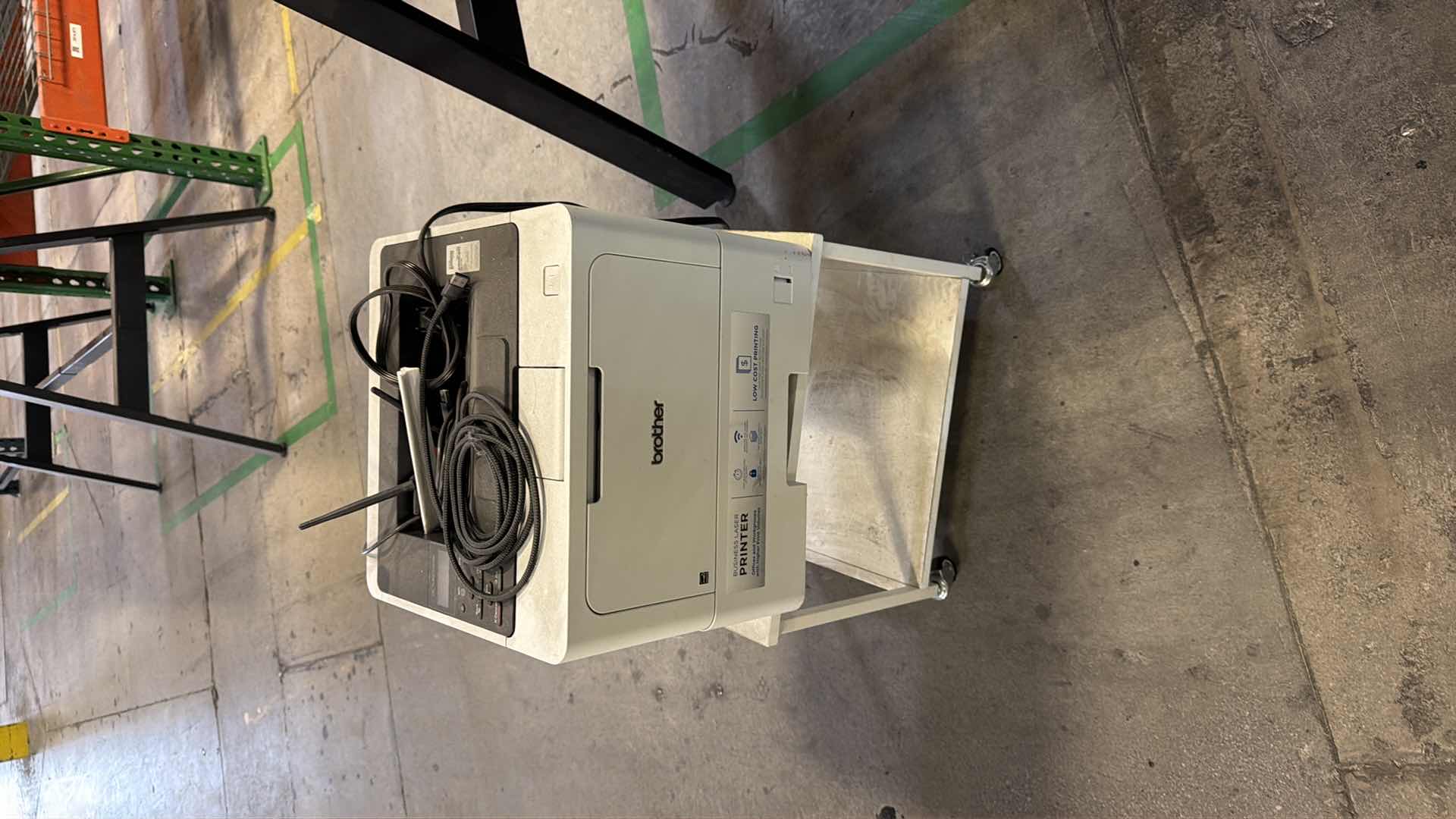 Photo 1 of Brother printer with rolling stand