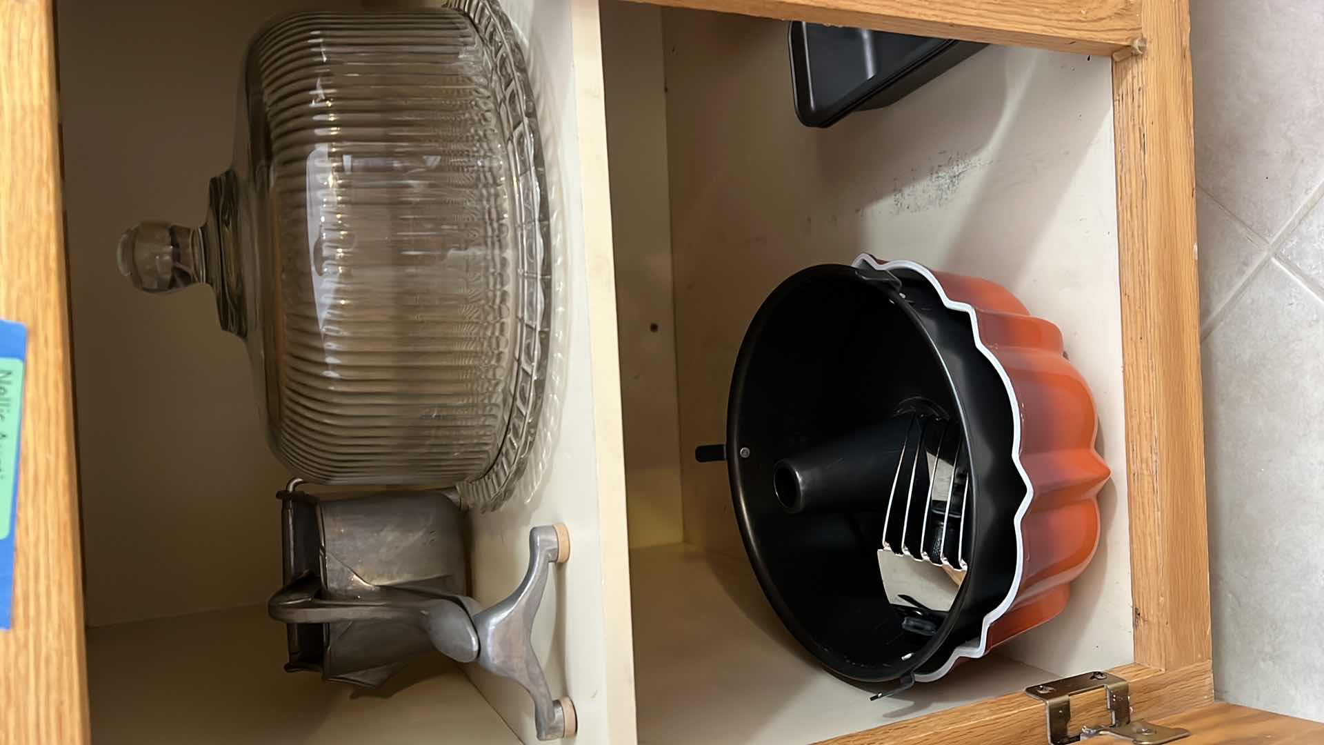 Photo 1 of CONTENTS OF KITCHEN CABINET.  BAKING WARE