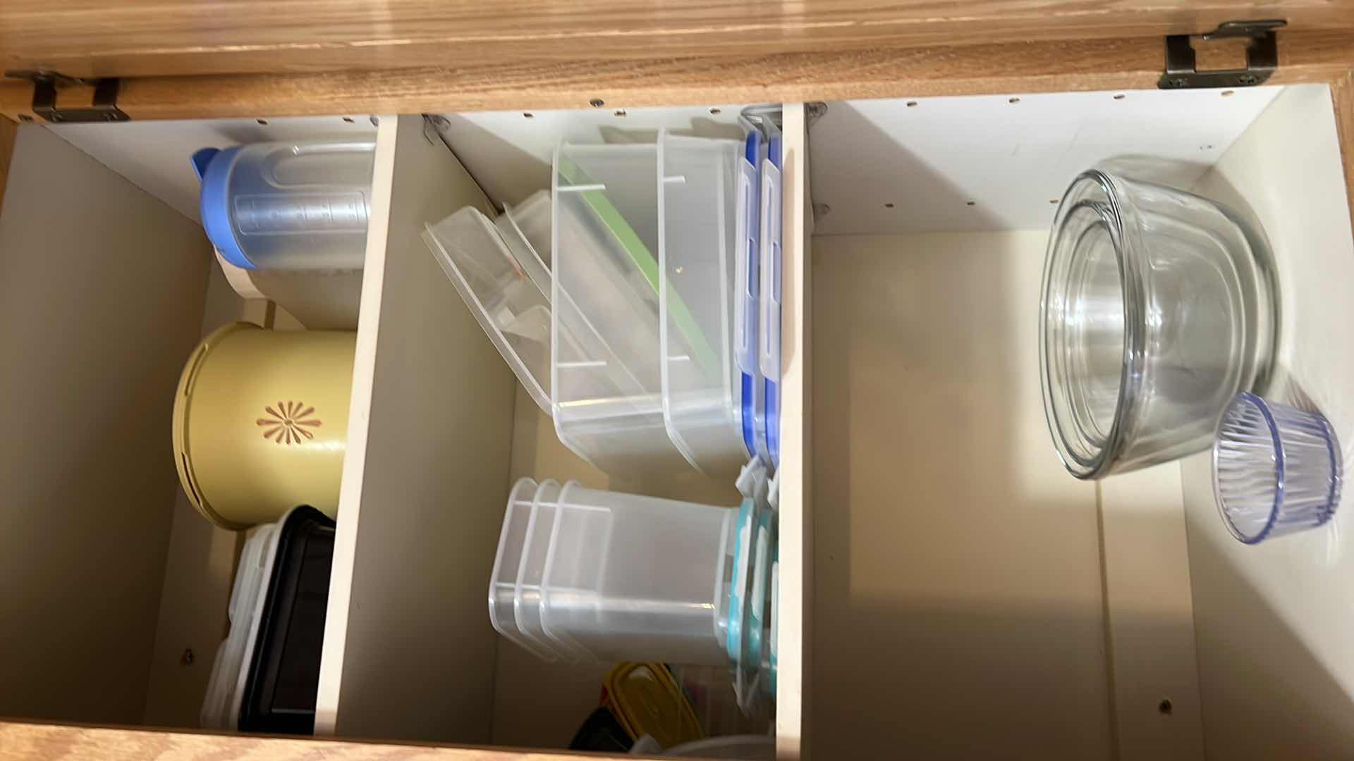 Photo 1 of CONTENTS OF KITCHEN CABINET. CONTAINERS FOR FOOD.