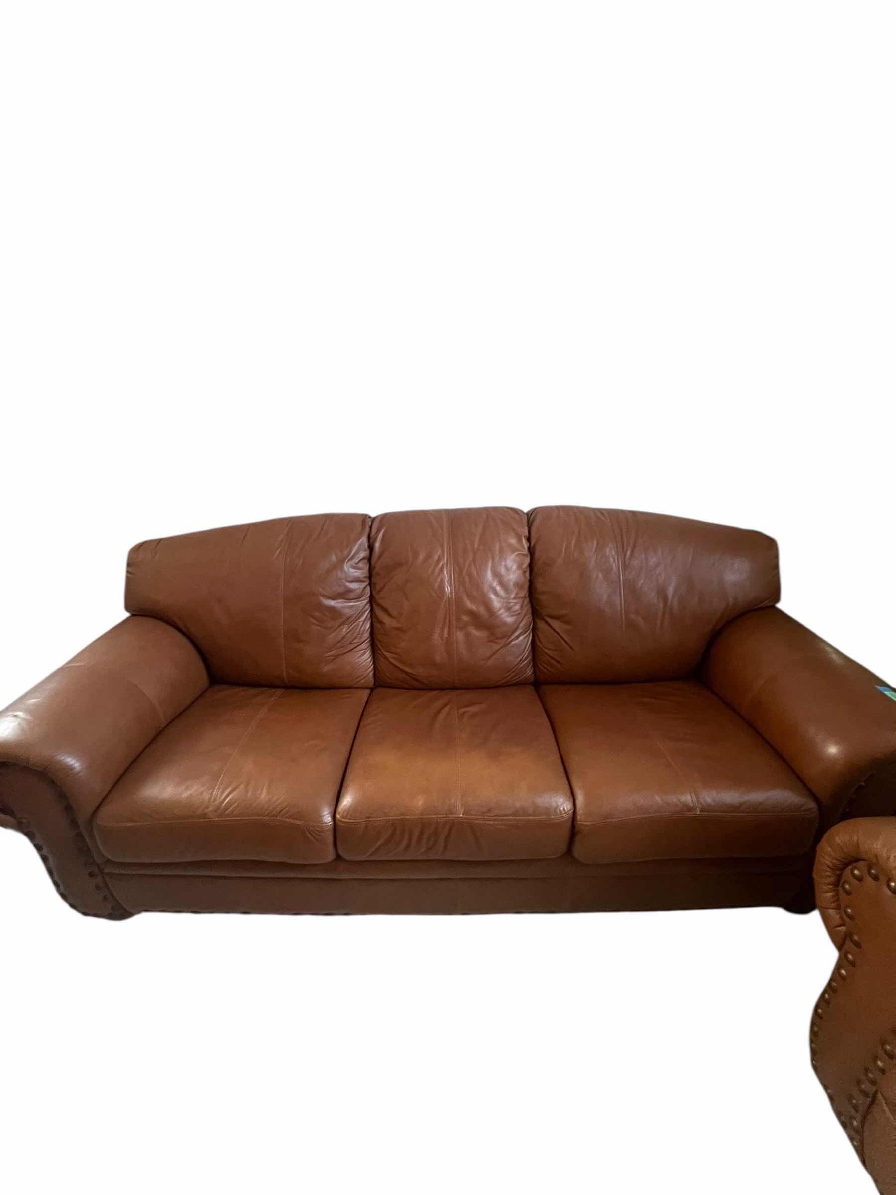 Photo 1 of 82”OVER STUFFED GENUINE LEATHER COUCH. PART OF MATCHING LIVING ROOM SET OF 3 PIECES (CHAIR AND LOVE SEAT SOLD SEPARATLEY)