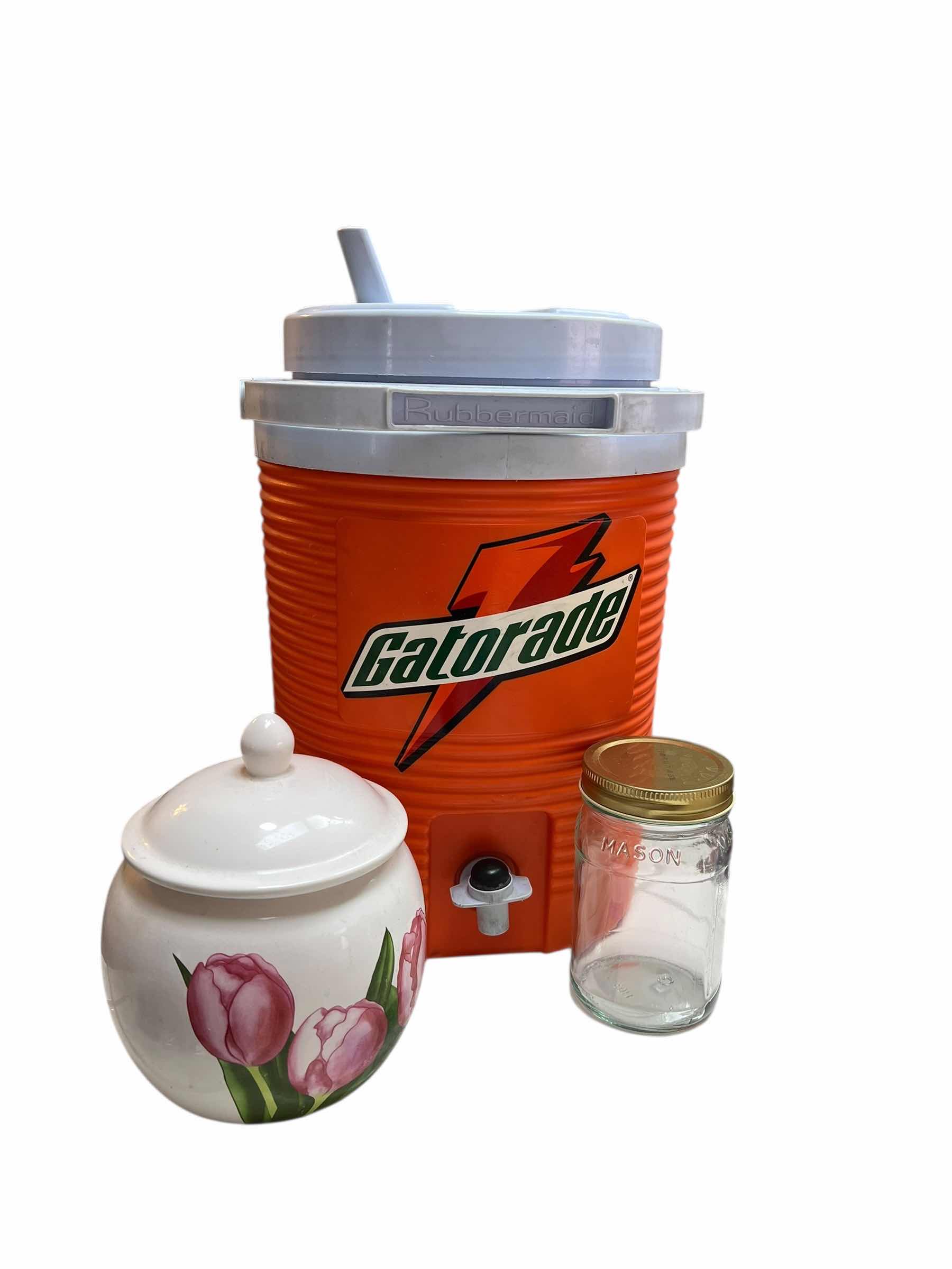 Photo 1 of CONTENTS OF COUNTER. 16” GATORADE THERMOS, CANDY JAR WITH LID, AND MASON JAR.