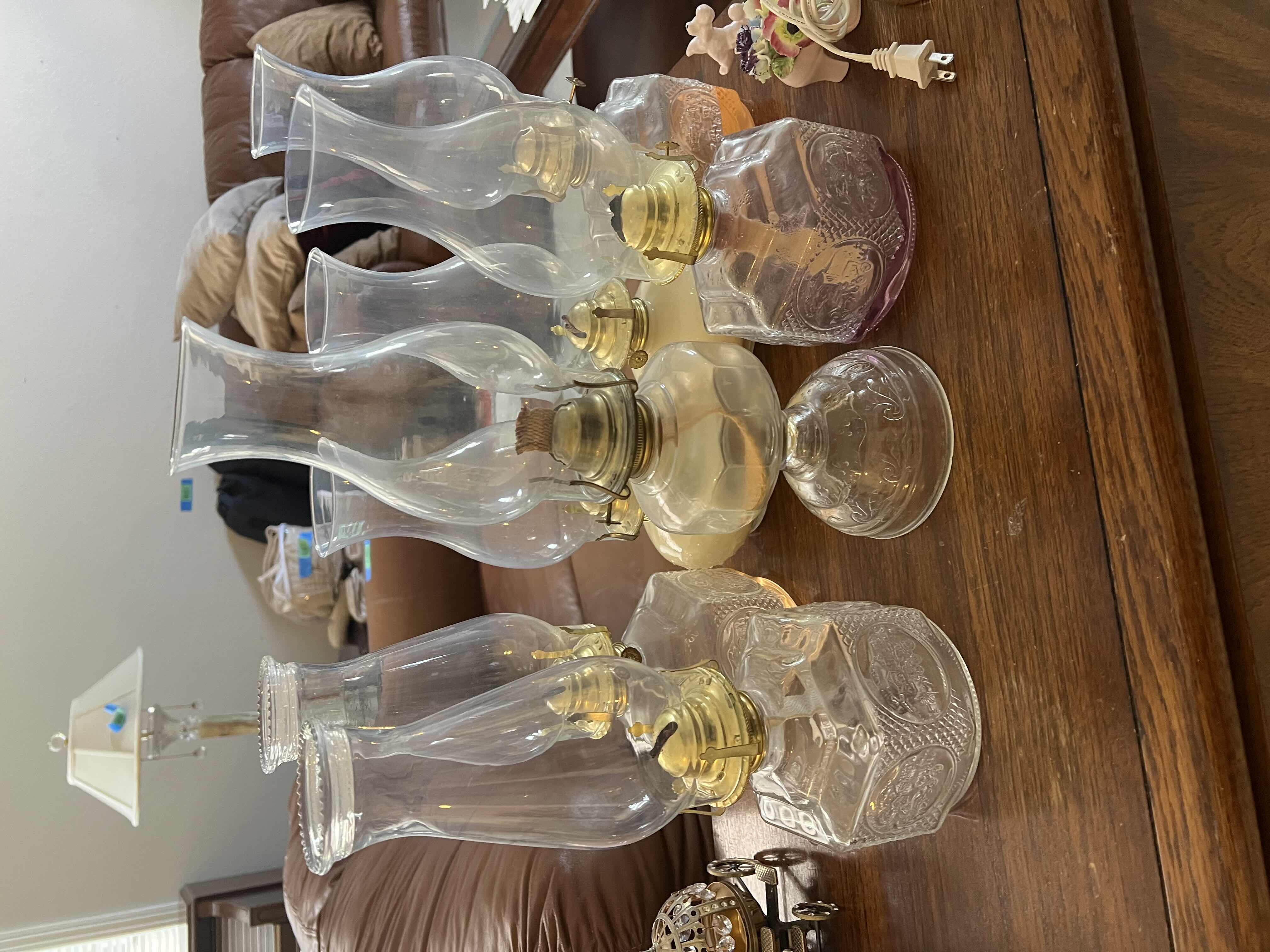 Photo 1 of VINTAGE DECORATIVE AND FUNCTIONAL OIL LANTERNS. 12”H GLASS