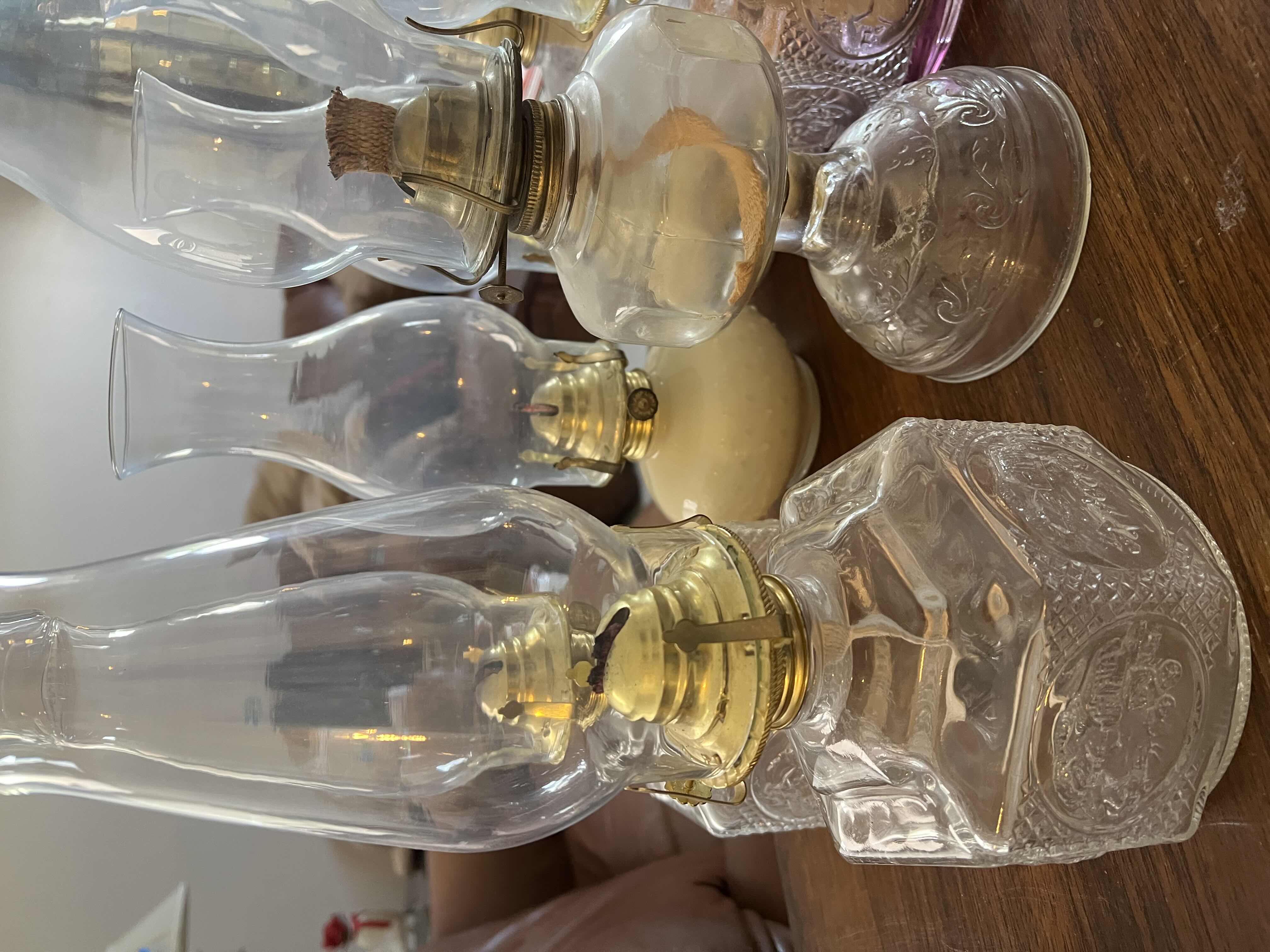 Photo 1 of VINTAGE DECORATIVE AND FUNCTIONAL OIL LANTERNS. 12”H GLASS