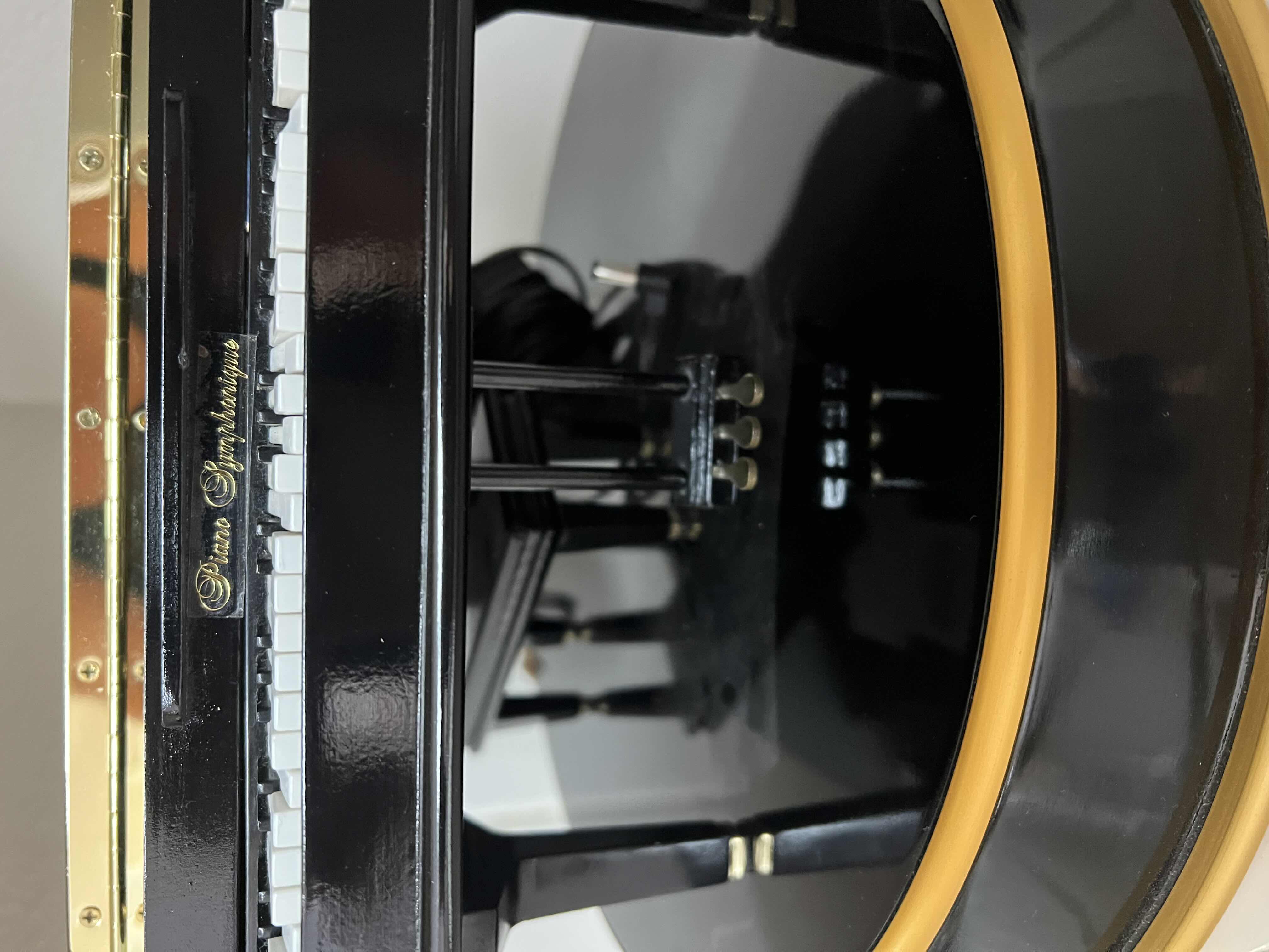 Photo 1 of DECORATIVE MUSIC BOX PIANO. 12”X8”H. PLAYS SEVERAL CHRISTMAS SONGS.  BEAUTIFUL COLLECTIBLE.