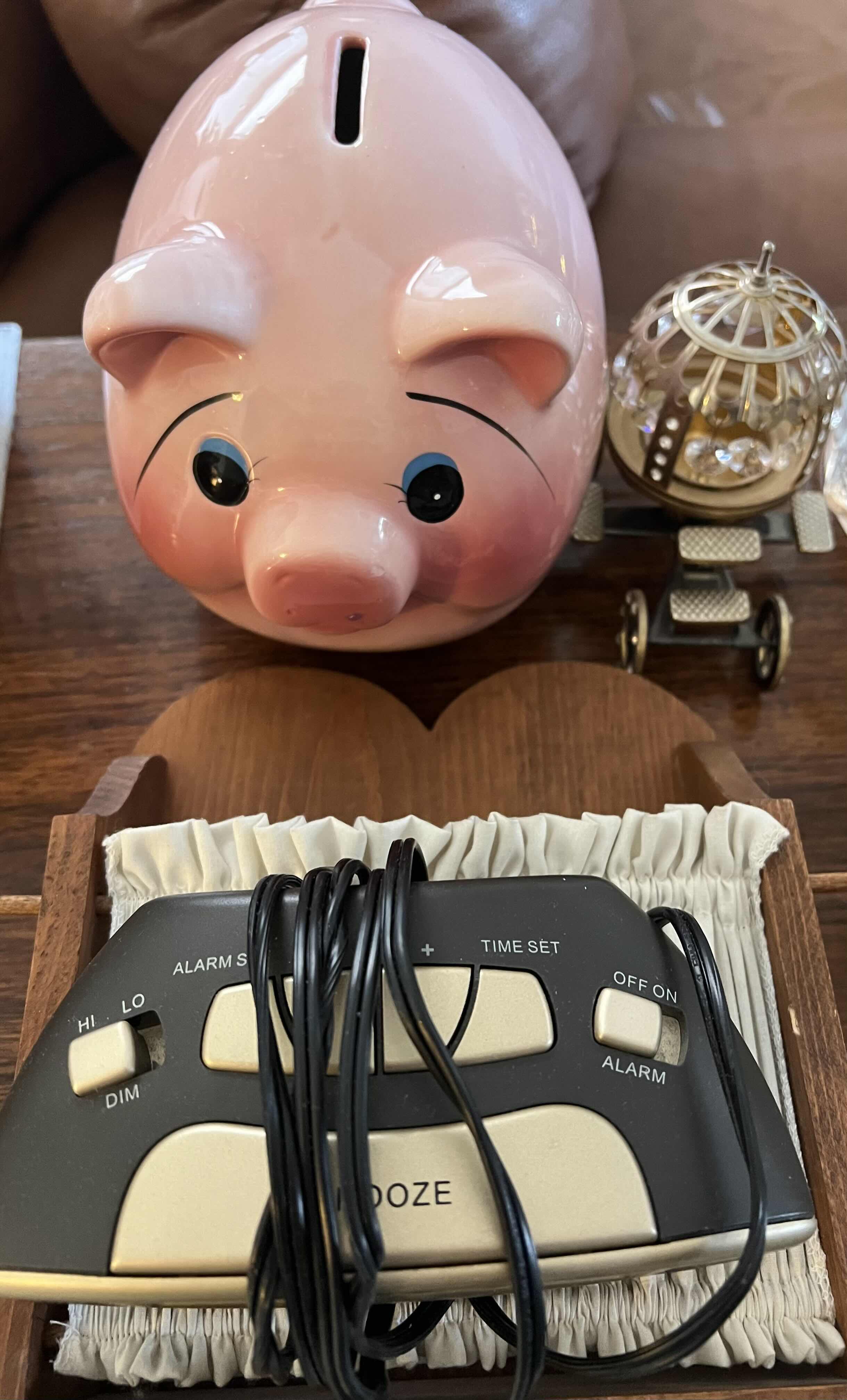 Photo 1 of CONTENTS OF CORNER.  PIGGY BANK AND DECORATIVE PIECES.