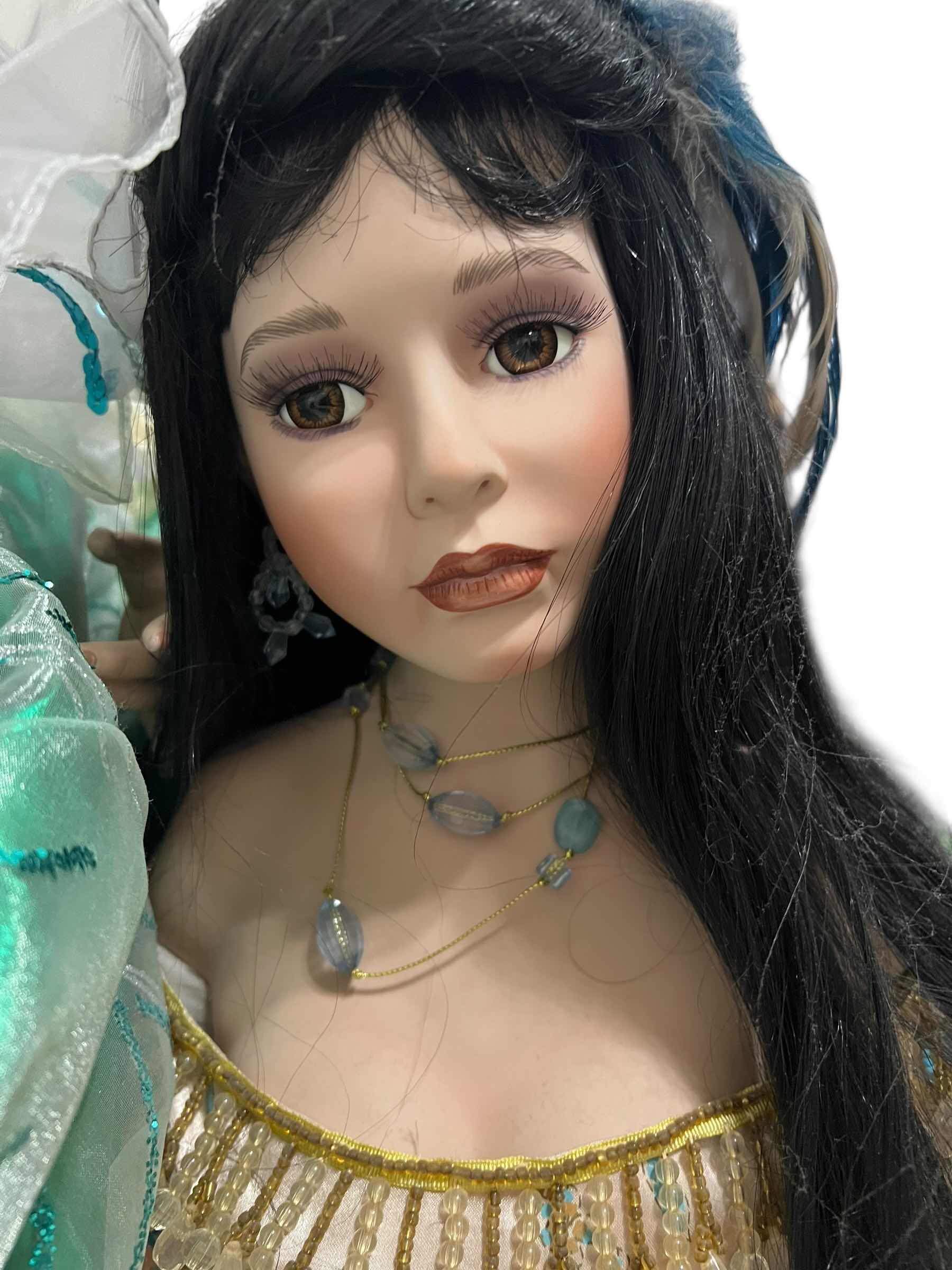Photo 1 of VINTAGE DONNA RUBERT CHEYENNE PORCELAIN DOLL. 34”H COLLECTIBLE.