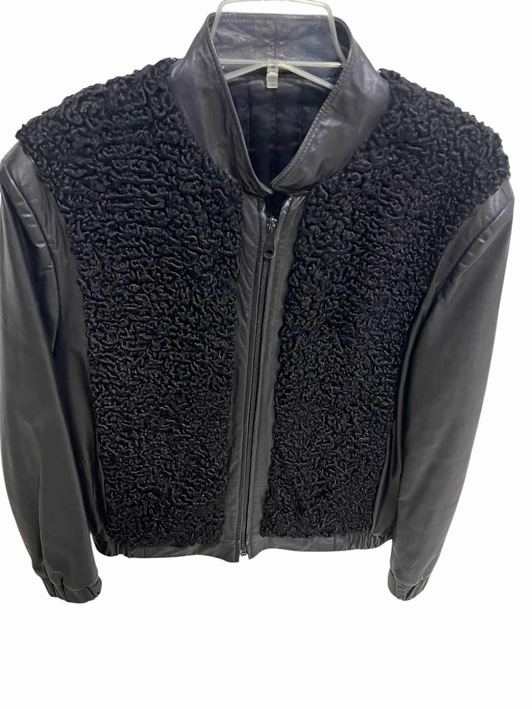 Photo 1 of LADIES COAT. BLACK SHEARLING AND LEATHER. PETITE SIZE 8.