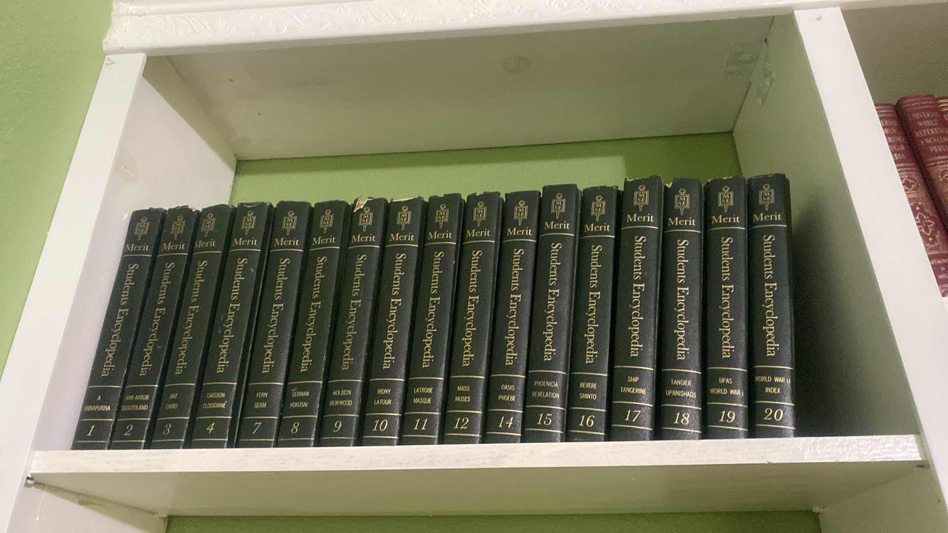 Photo 1 of 2 SHELVES BOOKS - MERIT STUDENTS ENCYCLOPEDIA VOLUMES 5 & 6 MISSING & ILLUSTRATED WORLD ENCYCLOPEDIA VOLUMES 1 -21
