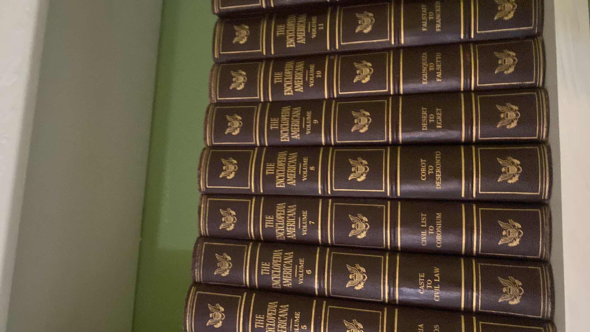 Photo 1 of 2 SHELF OF BOOKS - AMERICANA ENCYCLOPEDIAS