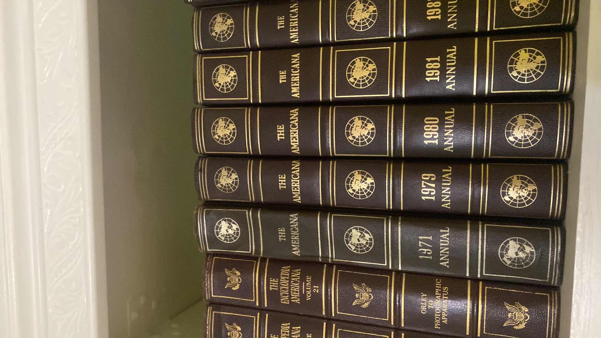 Photo 1 of 2 SHELF OF BOOKS - AMERICANA ENCYCLOPEDIAS