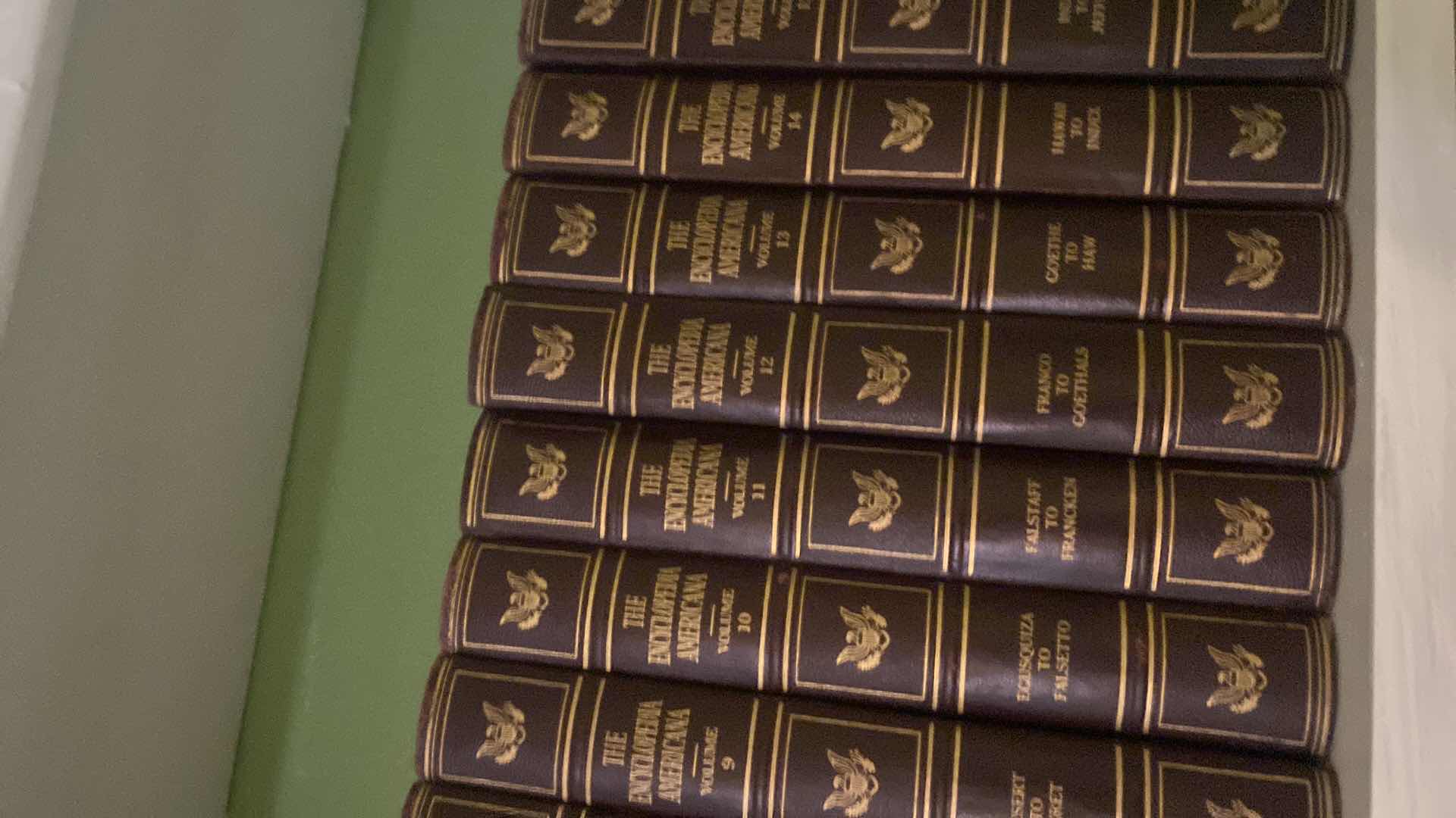 Photo 1 of 2 SHELF OF BOOKS - AMERICANA ENCYCLOPEDIAS