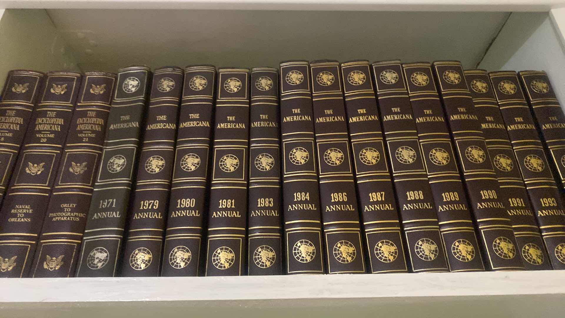 Photo 1 of 2 SHELF OF BOOKS - AMERICANA ENCYCLOPEDIAS