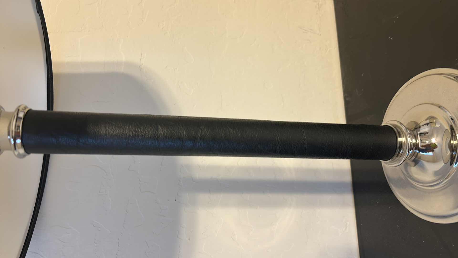 Photo 1 of 2 - BLACK LEATHER WRAPPED WITH SILVER ACCENTS AND BLACK OUTLINED WHITE SHADESTABLE LAMP  H28”