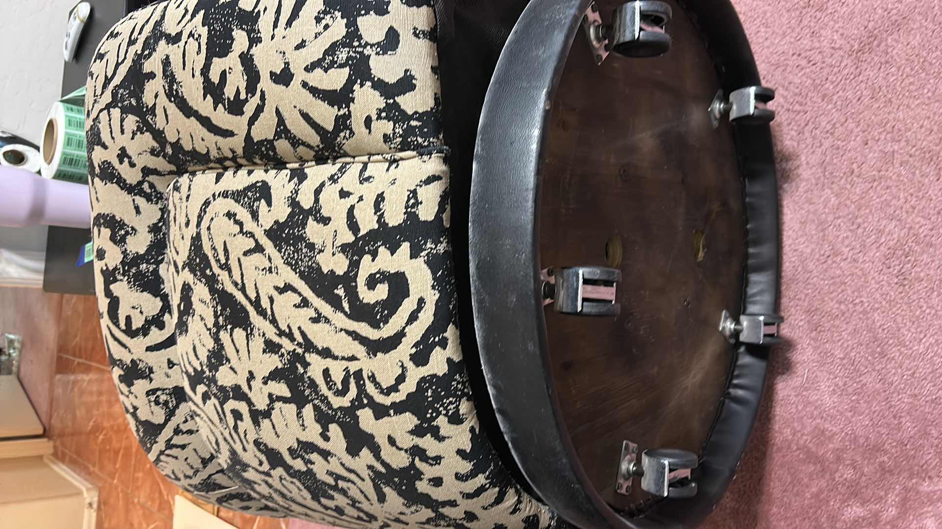 Photo 1 of BLACK AND TAN ROTATING WHEELED PETITE OCCASIONAL CHAIR 31“ x 31“ x H26“