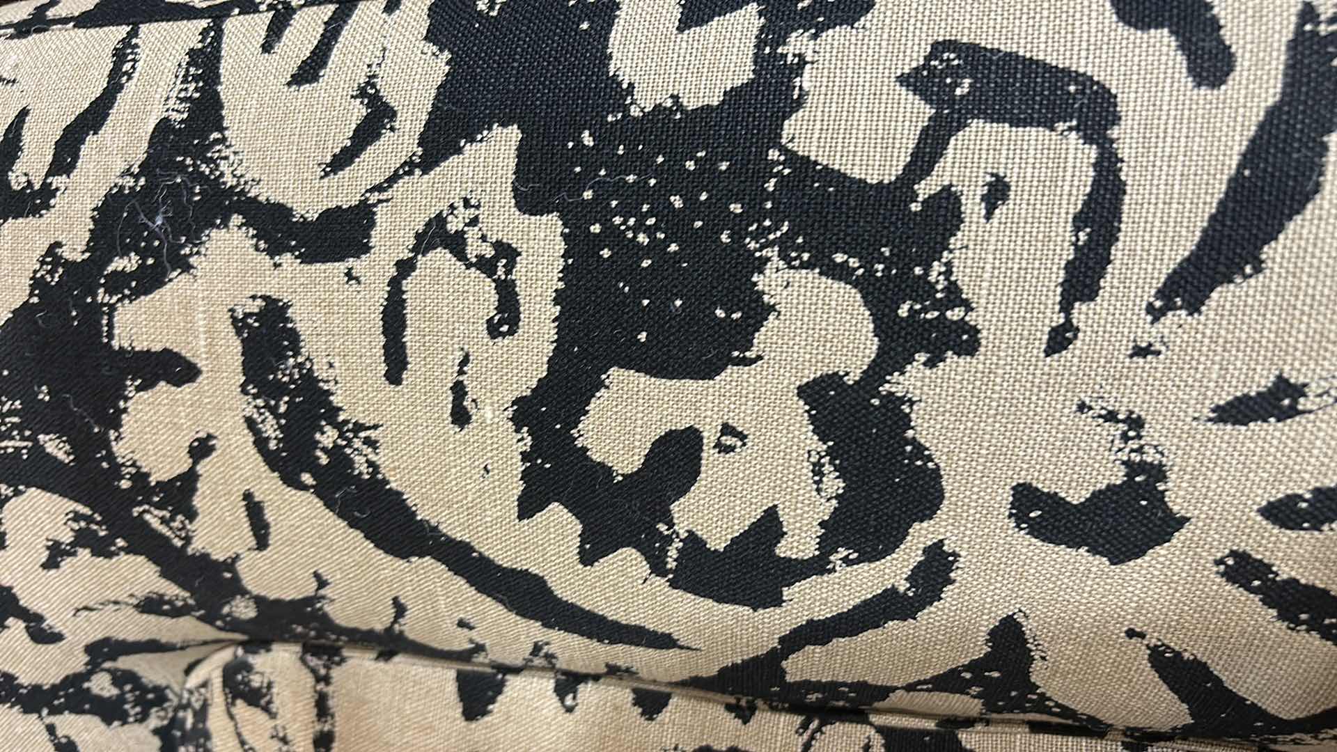 Photo 1 of BLACK AND TAN ROTATING WHEELED PETITE OCCASIONAL CHAIR 31“ x 31“ x H26“