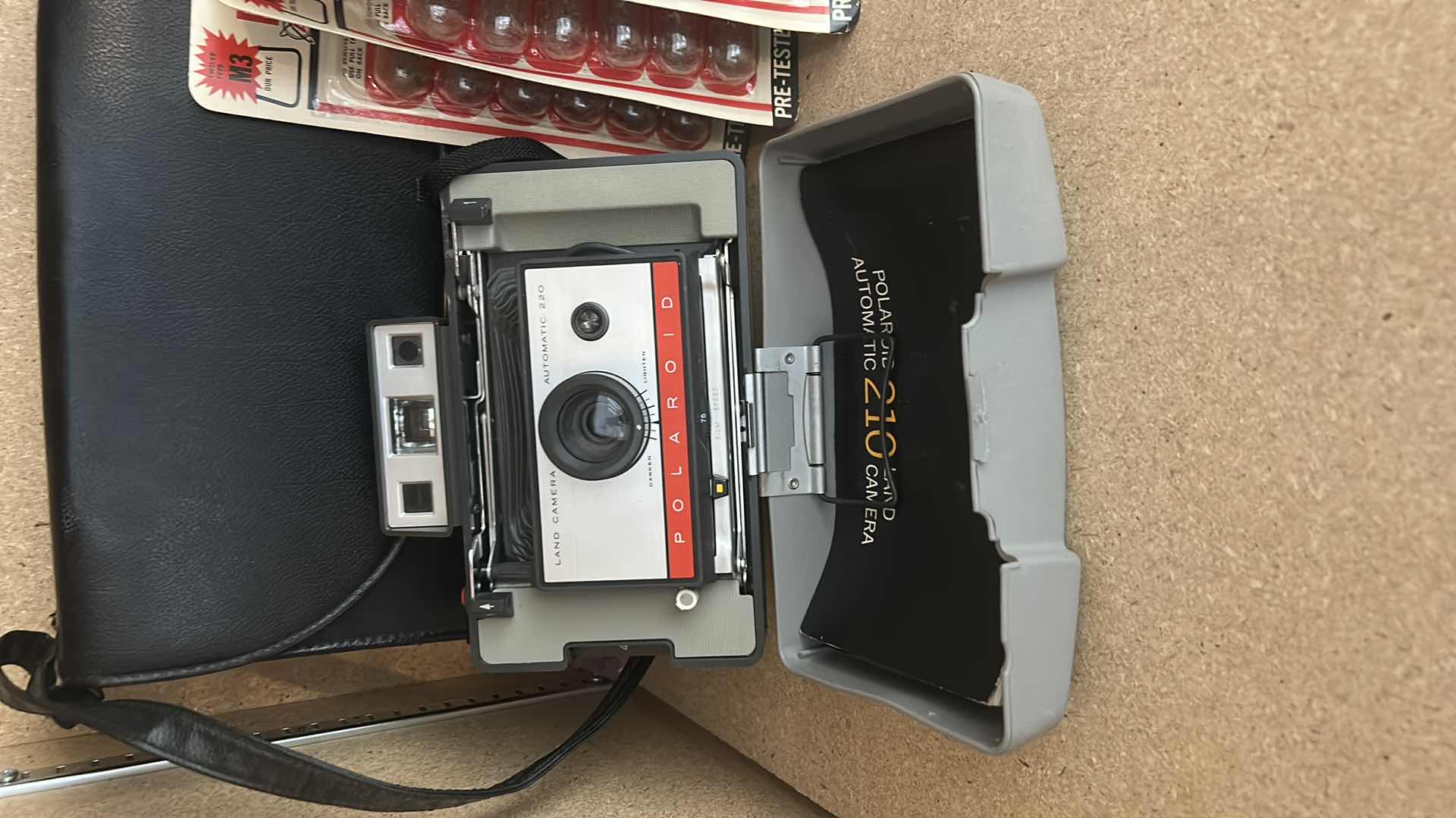 Photo 1 of VINTAGE POLAROID CAMERA WITH CASE, FLASHGUN & PHOTO FLASH BULBS