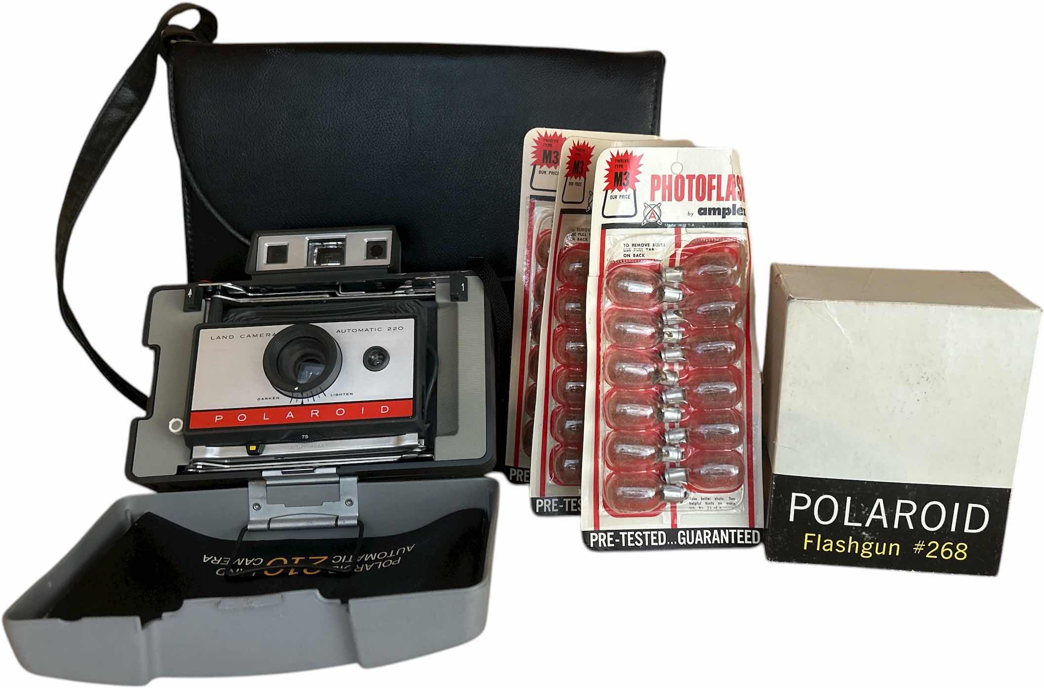Photo 1 of VINTAGE POLAROID CAMERA WITH CASE, FLASHGUN & PHOTO FLASH BULBS