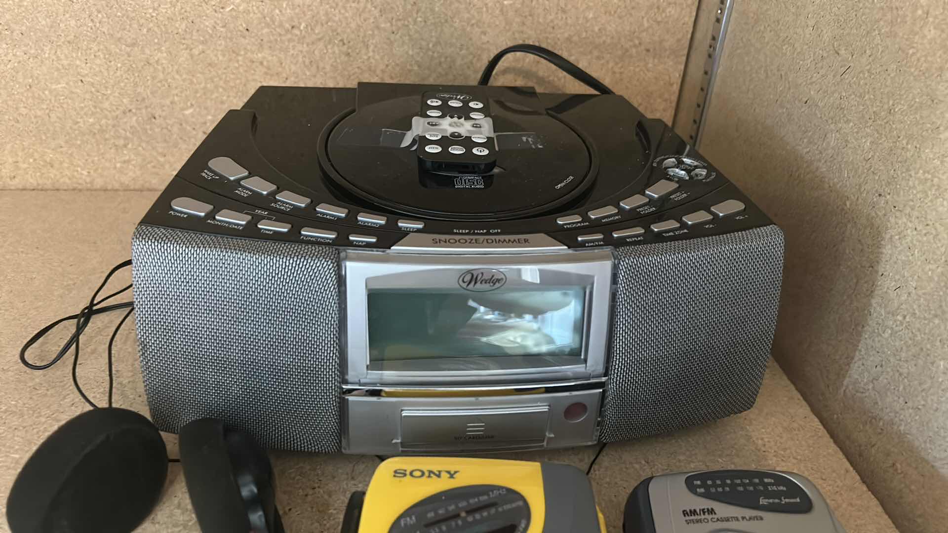 Photo 1 of ELECTRONICS- SONY WALKMAN, AM FM STEREO CASSETTE PLAYER, WEDGE AM FM ALARM