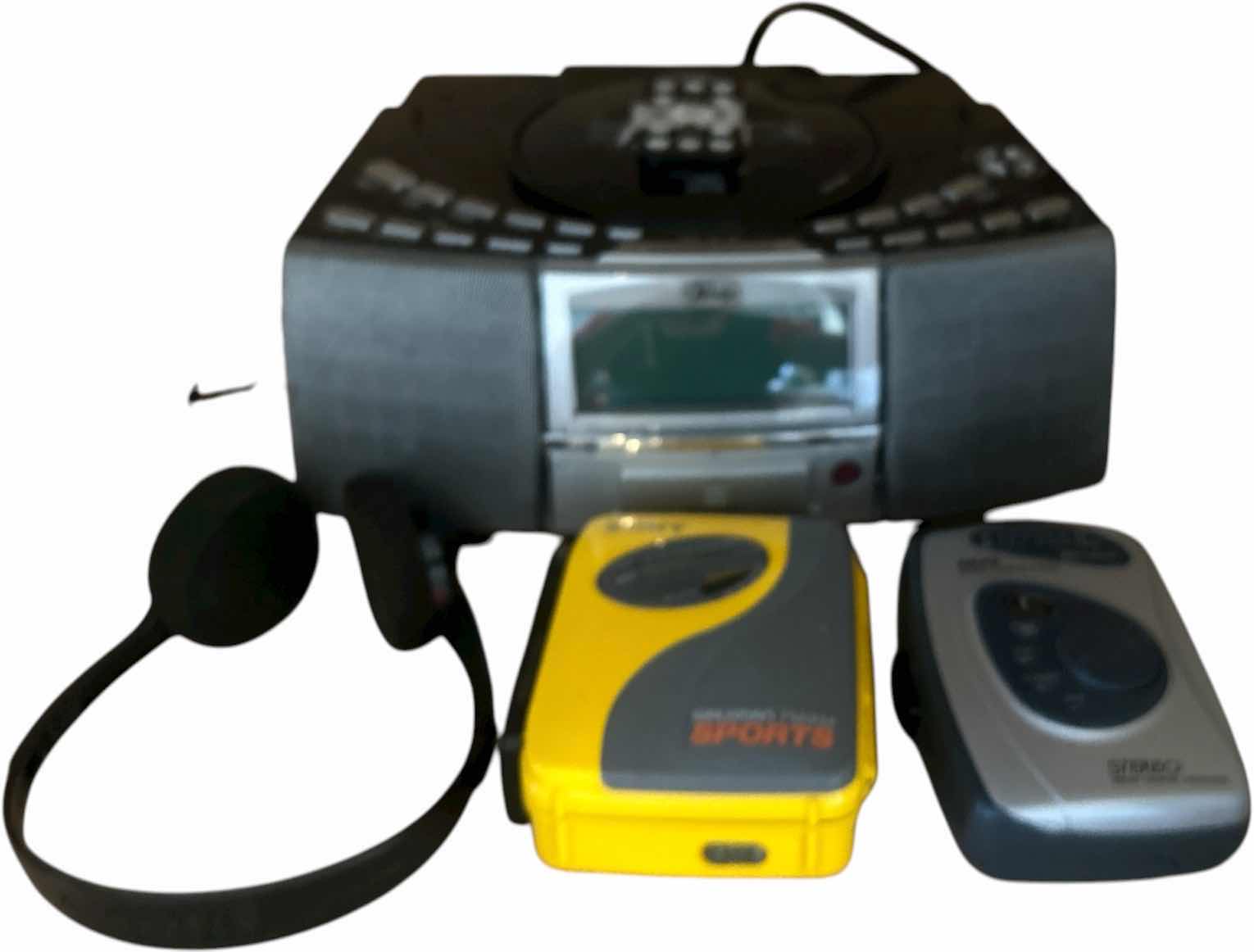 Photo 1 of ELECTRONICS- SONY WALKMAN, AM FM STEREO CASSETTE PLAYER, WEDGE AM FM ALARM