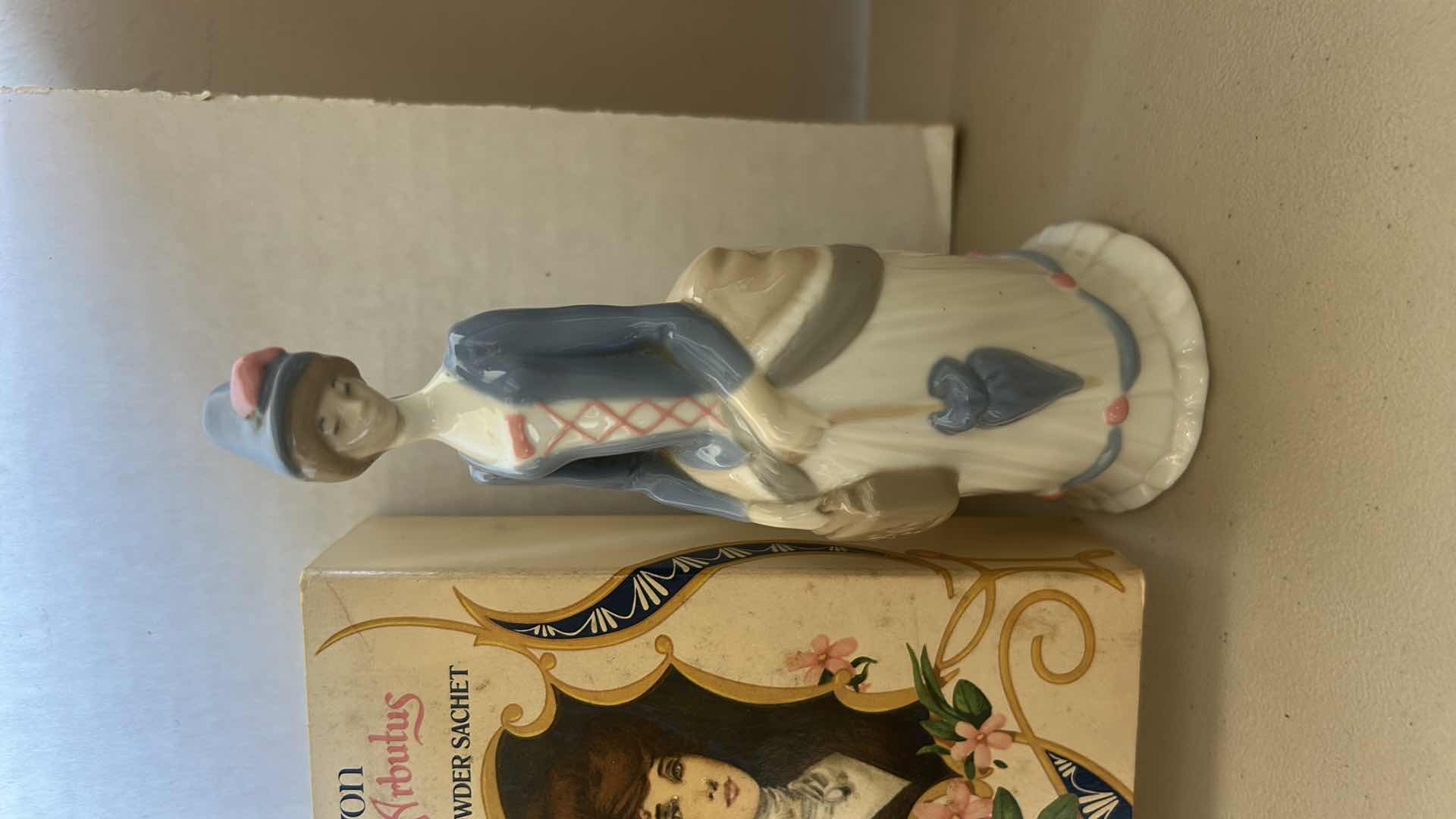 Photo 1 of AVON POWDER SACHET AND PORCELAIN FIGURINE
