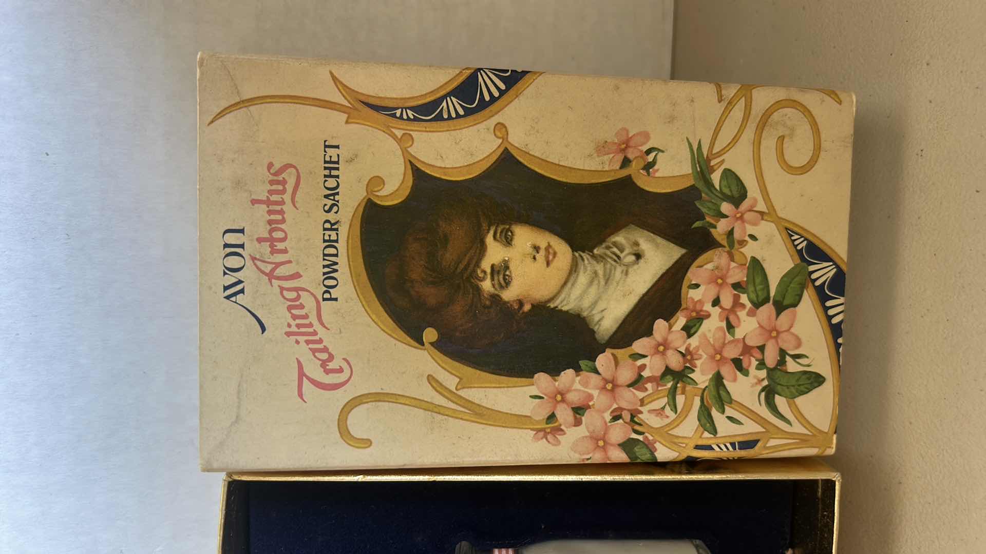 Photo 1 of AVON POWDER SACHET AND PORCELAIN FIGURINE