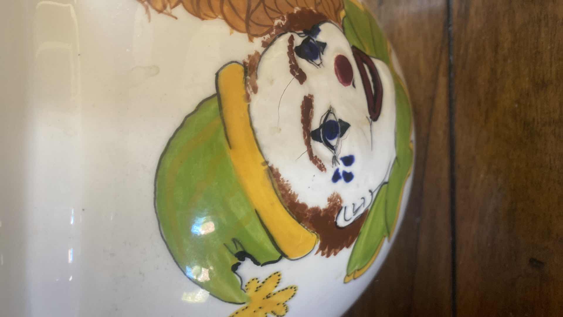 Photo 1 of HAND PAINTED CERAMIC POT WITH CLOWNS 8 1/2” x 7”