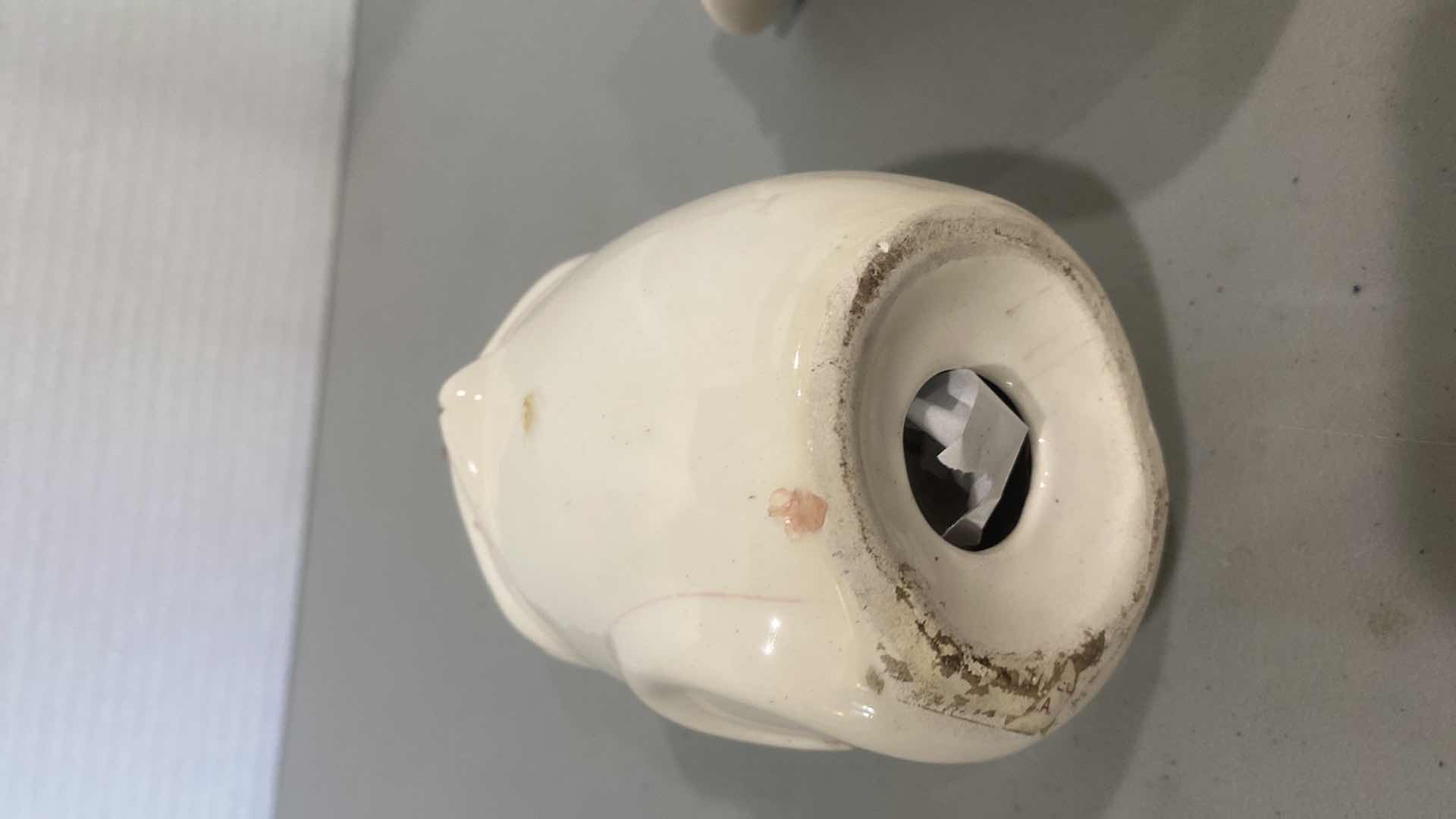 Photo 1 of CERAMIC PARMESAN CHEESE SHAKERS (plugs are missing on the bottom)