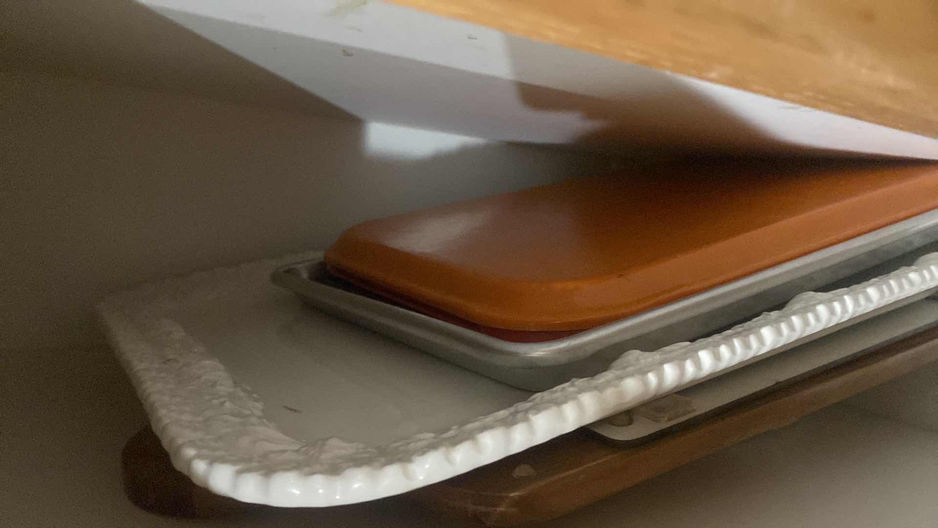 Photo 1 of CONTENTS OF CABINET - TURKEY PLATTER AND CUTTING BOARDS