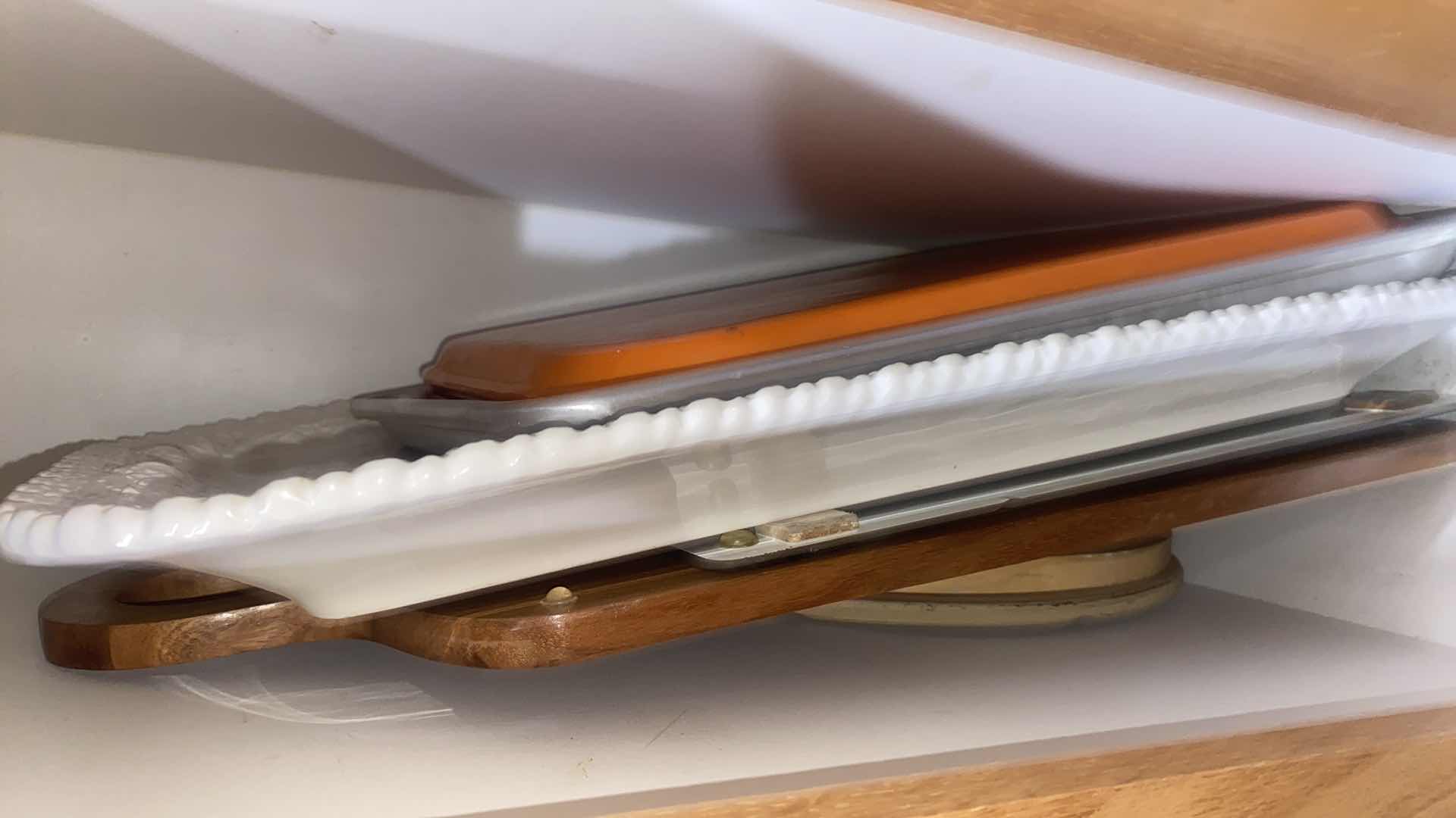 Photo 1 of CONTENTS OF CABINET - TURKEY PLATTER AND CUTTING BOARDS