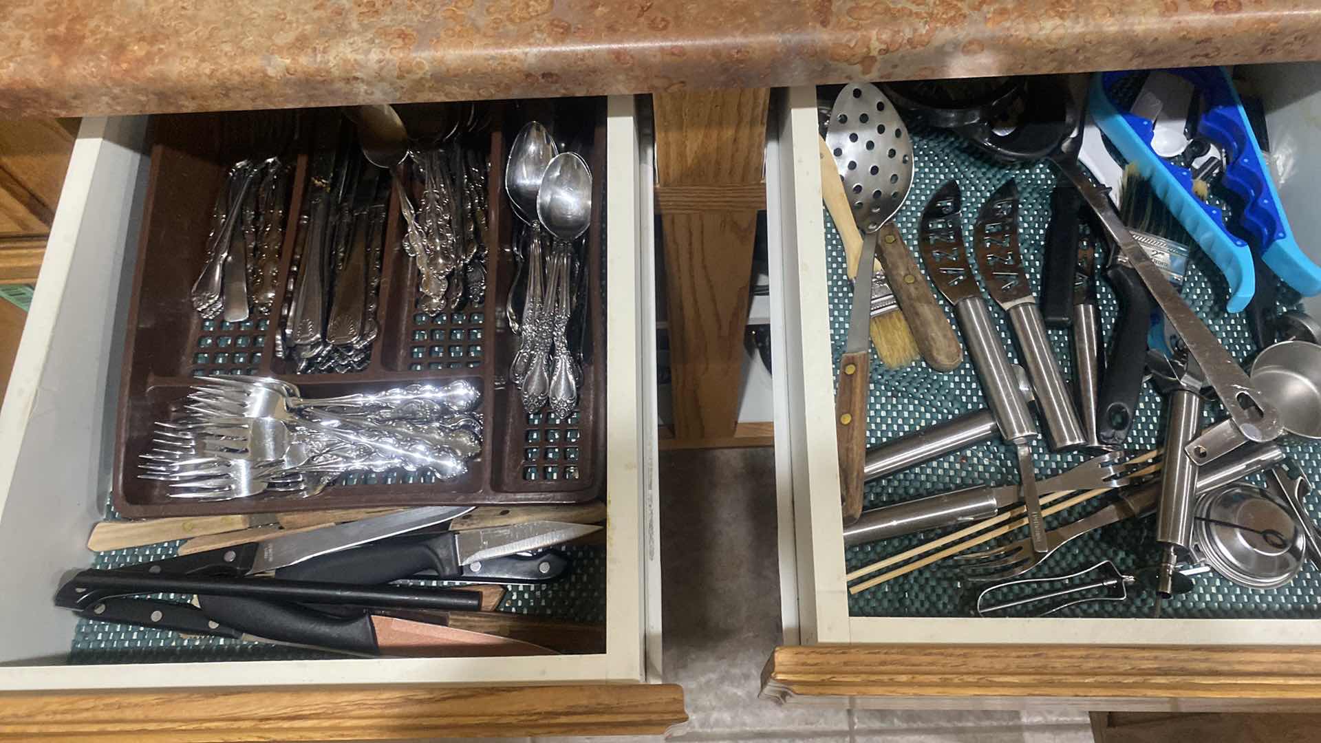 Photo 1 of CONTENTS OF CABINET -SILVERWARE & KITCHEN TOOLS
