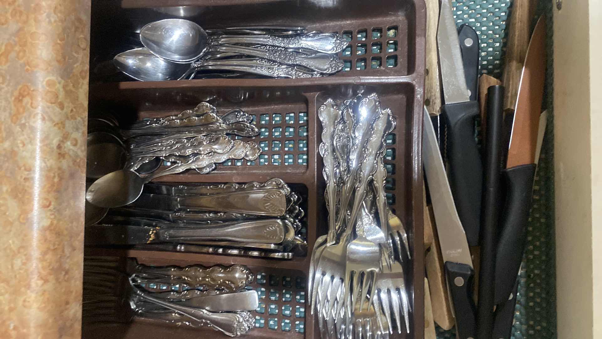 Photo 1 of CONTENTS OF CABINET -SILVERWARE & KITCHEN TOOLS