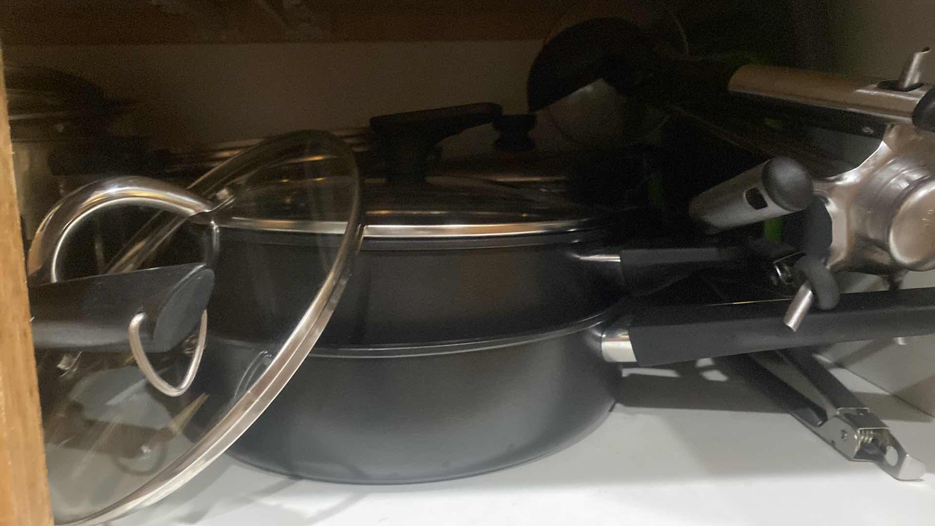 Photo 1 of CONTENTS OF CABINET - POTS & PANS