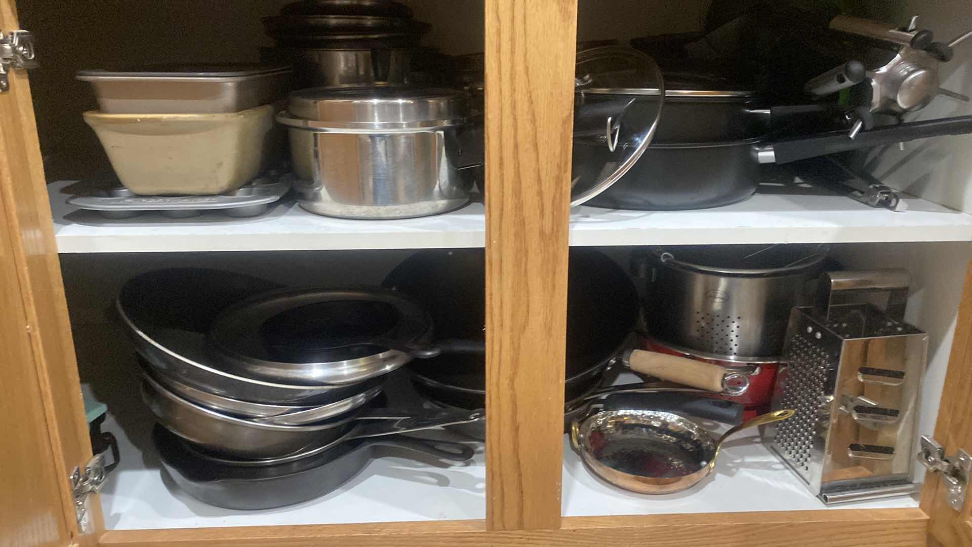 Photo 1 of CONTENTS OF CABINET - POTS & PANS