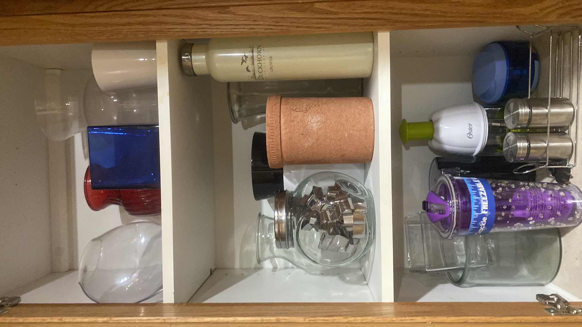 Photo 1 of CONTENTS OF CABINET - VASES L, DUCKHORN BOTTLE & MORE