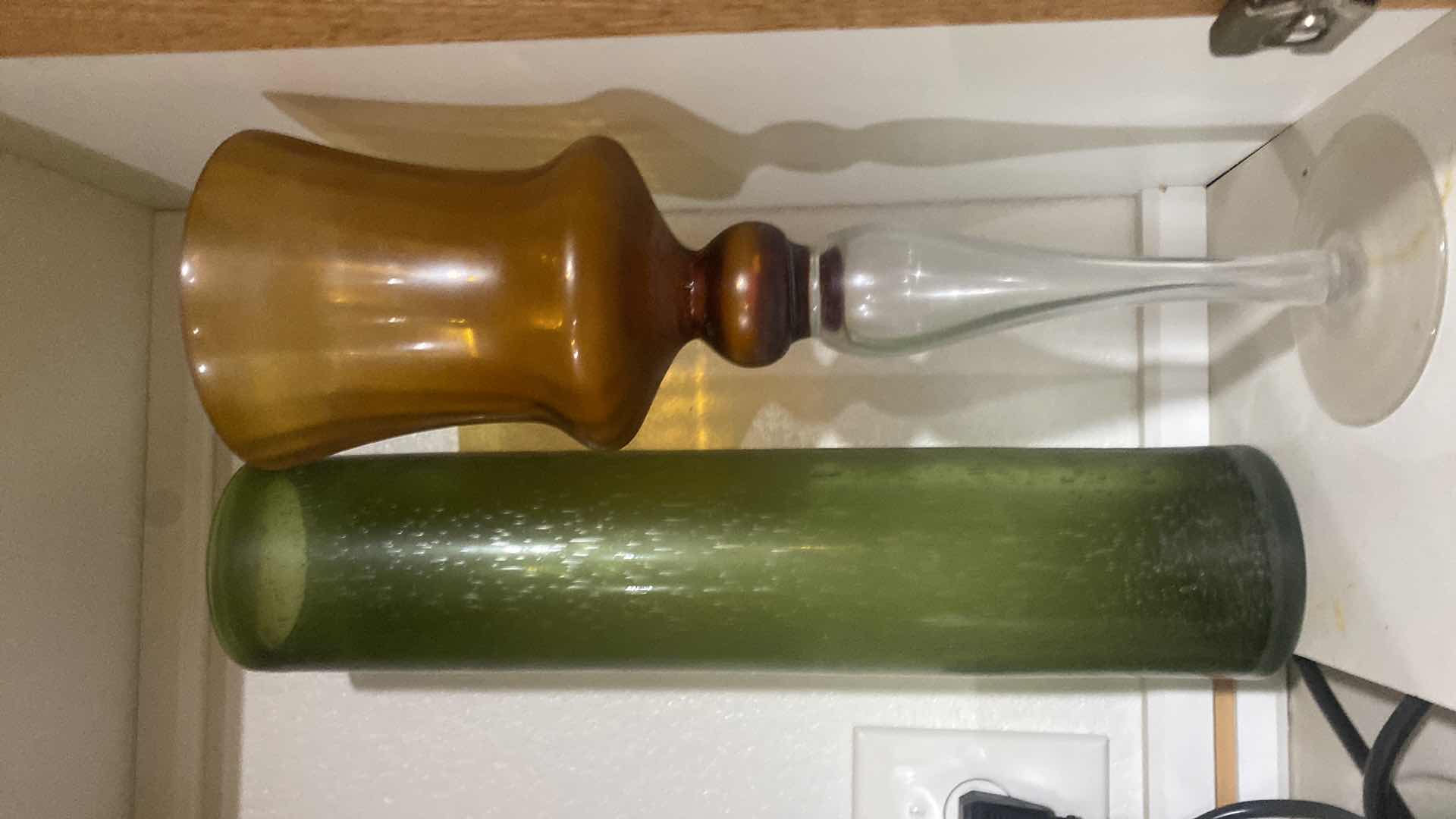 Photo 1 of CONTENTS OF CABINET - GLASS CANDLE HOLDER & GREEN GLASS VASE H17”