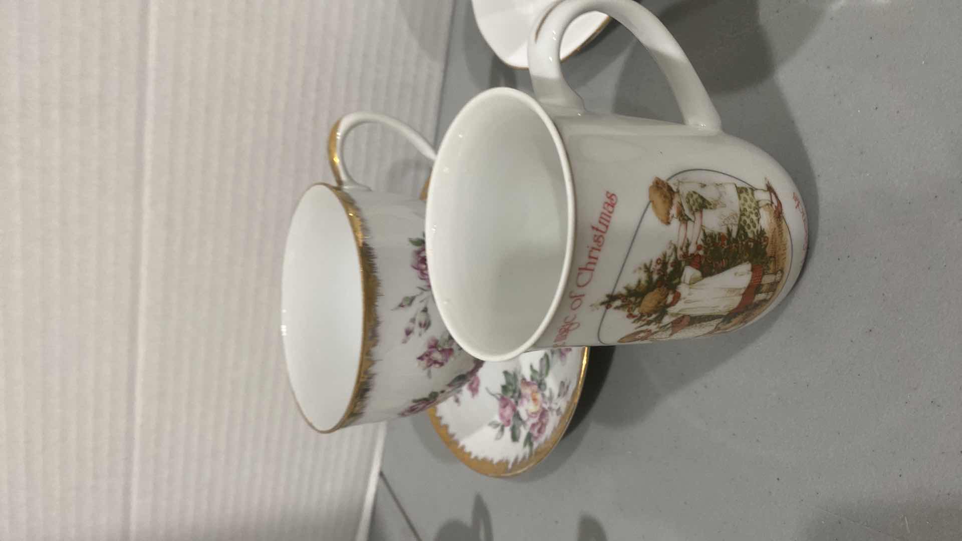 Photo 1 of 2 TEACUPS & SAUCERS & 4 TEACUPS