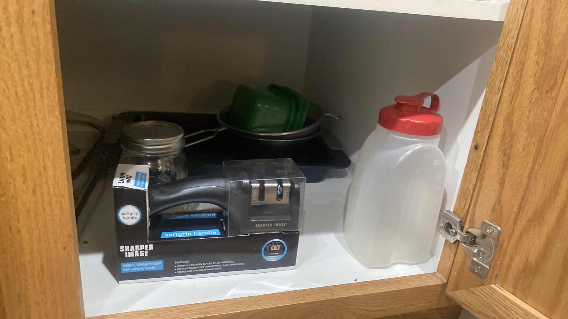 Photo 1 of CONTENTS OF CABINET - GLASS BAKEWARE & PLASTIC COLANDERS & MORE