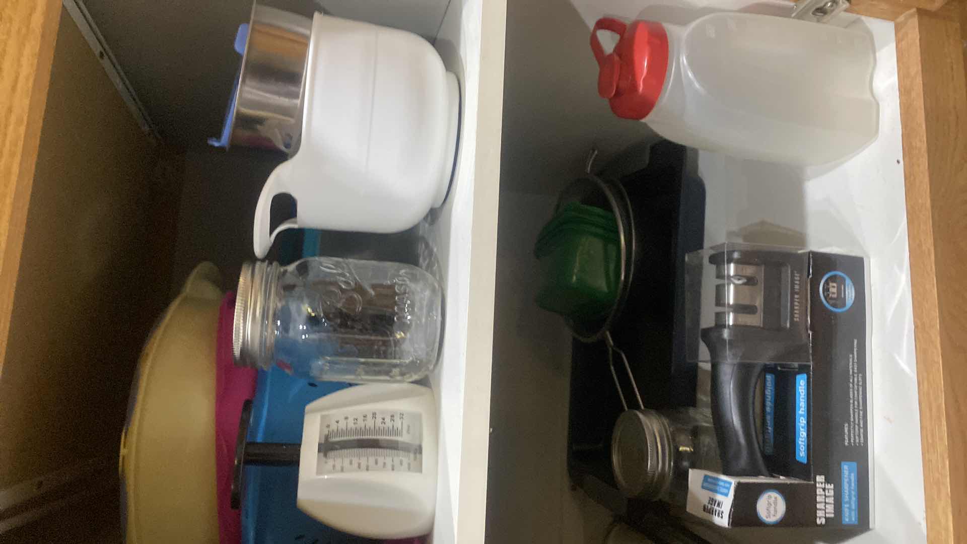 Photo 1 of CONTENTS OF CABINET - GLASS BAKEWARE & PLASTIC COLANDERS & MORE