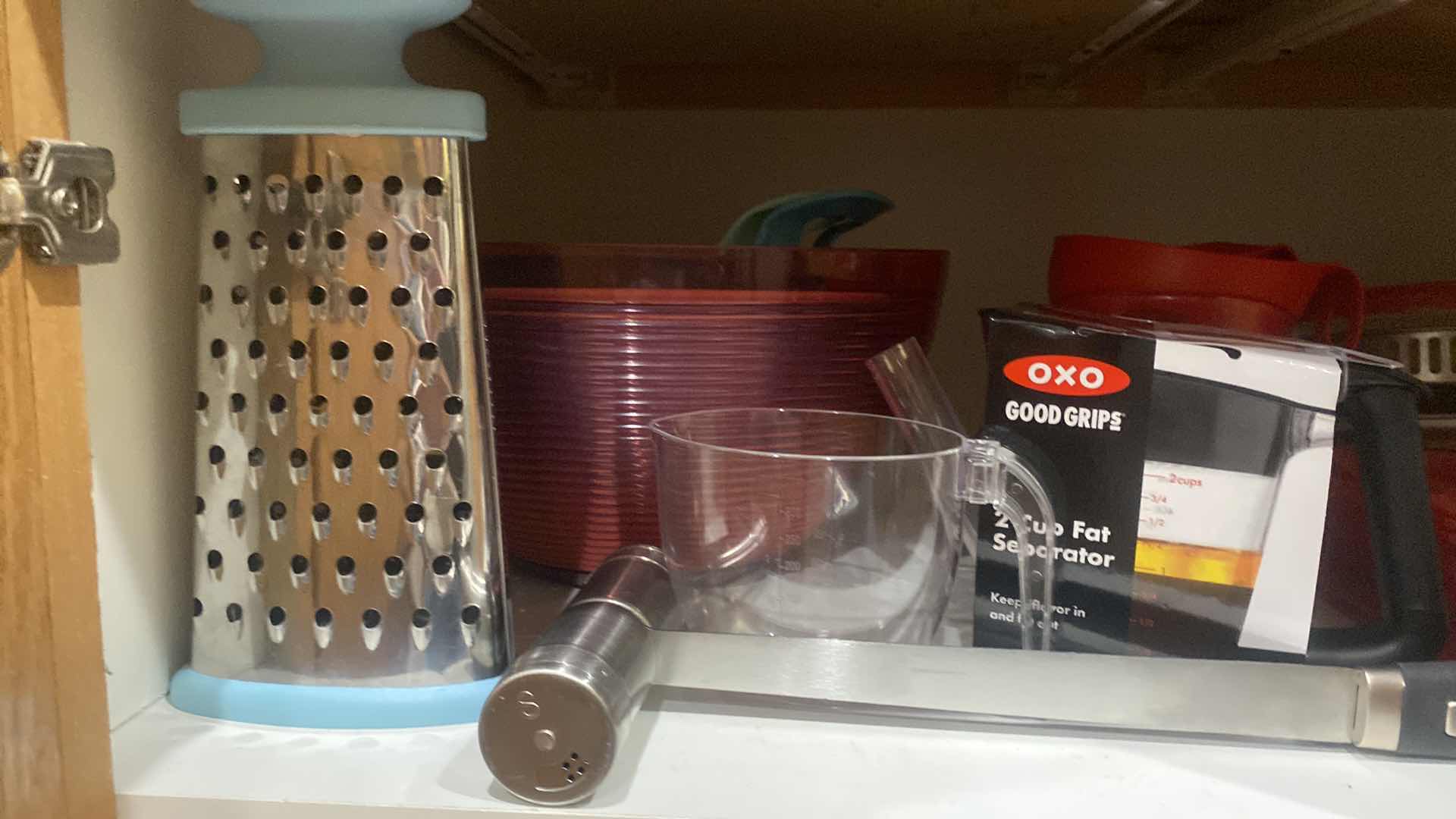 Photo 1 of CONTENTS OF CABINET - GLASS BAKEWARE & PLASTIC COLANDERS & MORE