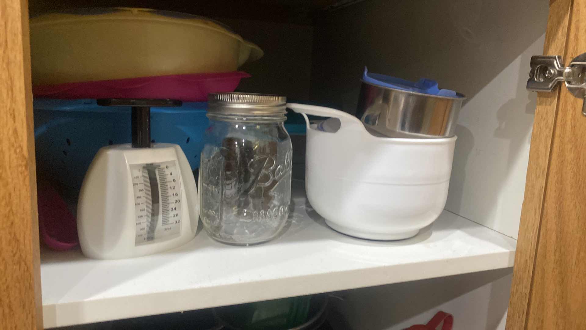Photo 1 of CONTENTS OF CABINET - GLASS BAKEWARE & PLASTIC COLANDERS & MORE