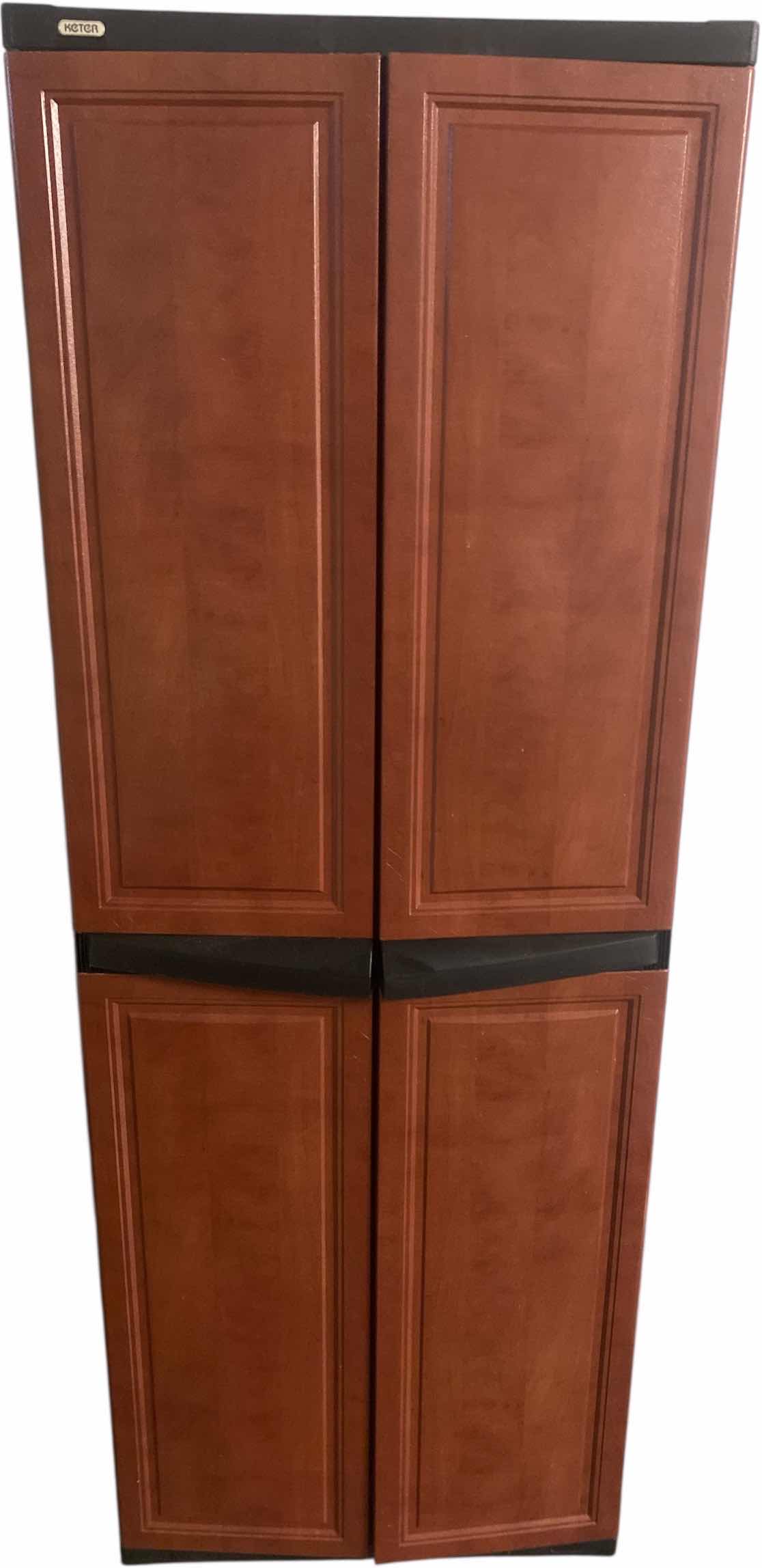 Photo 1 of KETER 2 DOOR 4 SHELF PLASTIC STORAGE UNIT 26“ x 18“ H69”