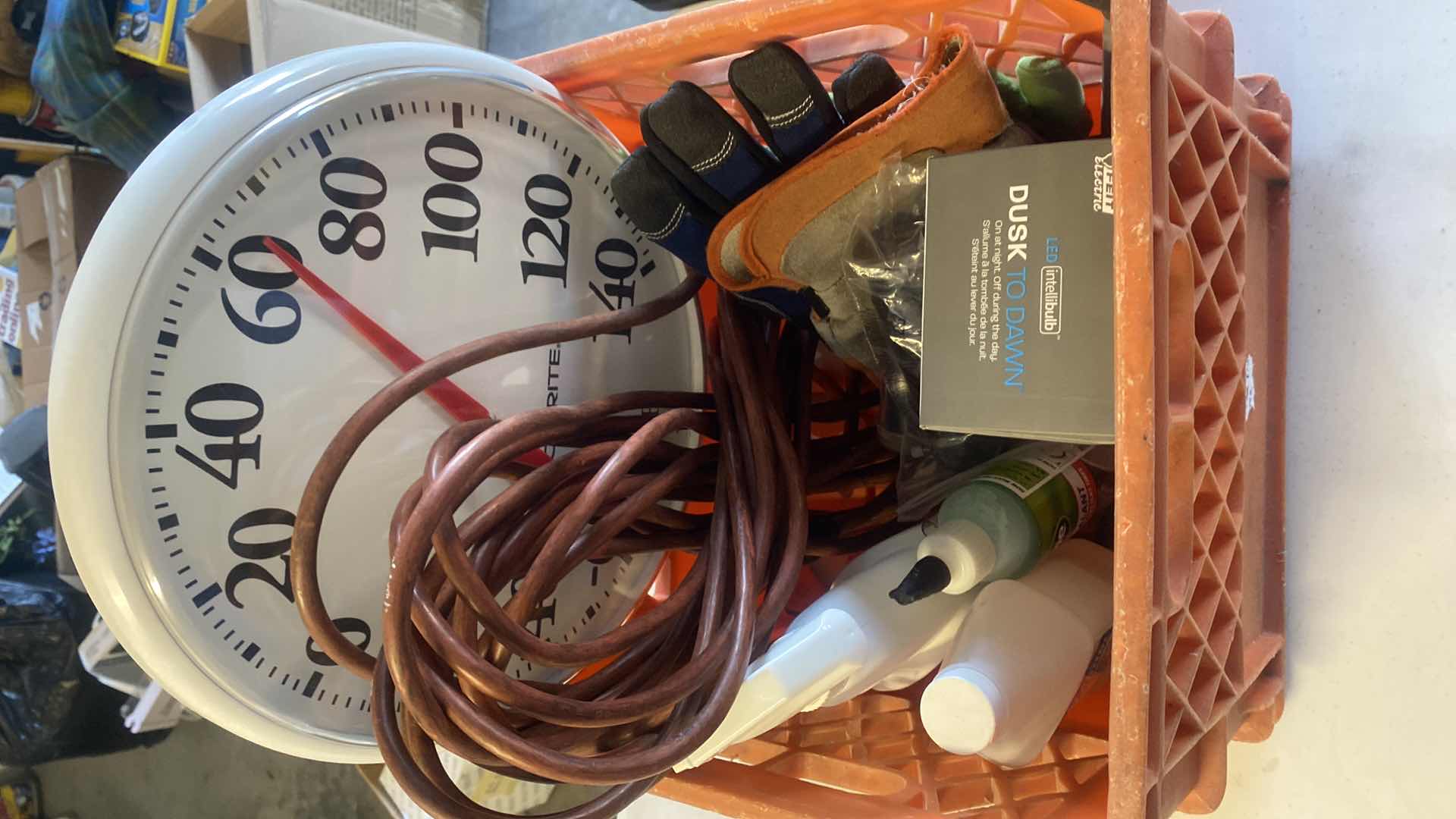 Photo 1 of CRATE WITH EXTENSION CORD, GARDENING & DUSK TO DAWN LIGHT BULB