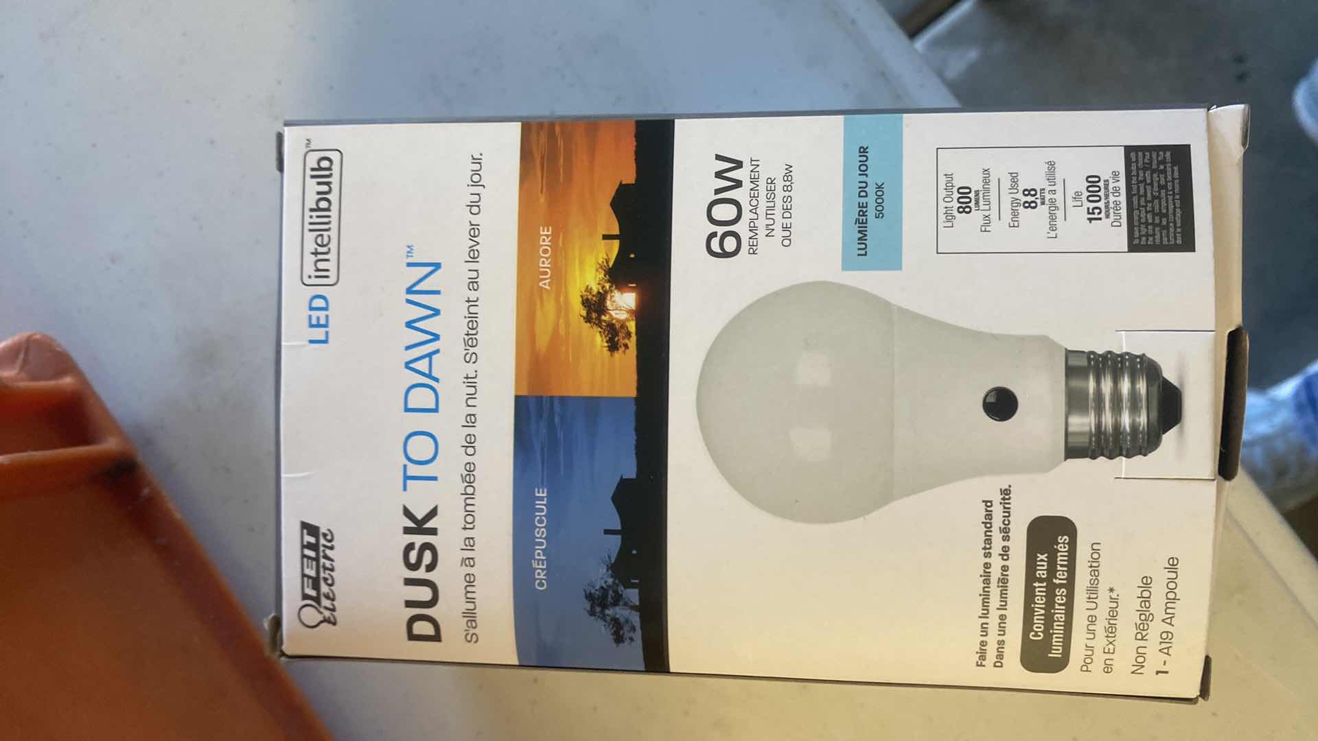 Photo 1 of CRATE WITH EXTENSION CORD, GARDENING & DUSK TO DAWN LIGHT BULB